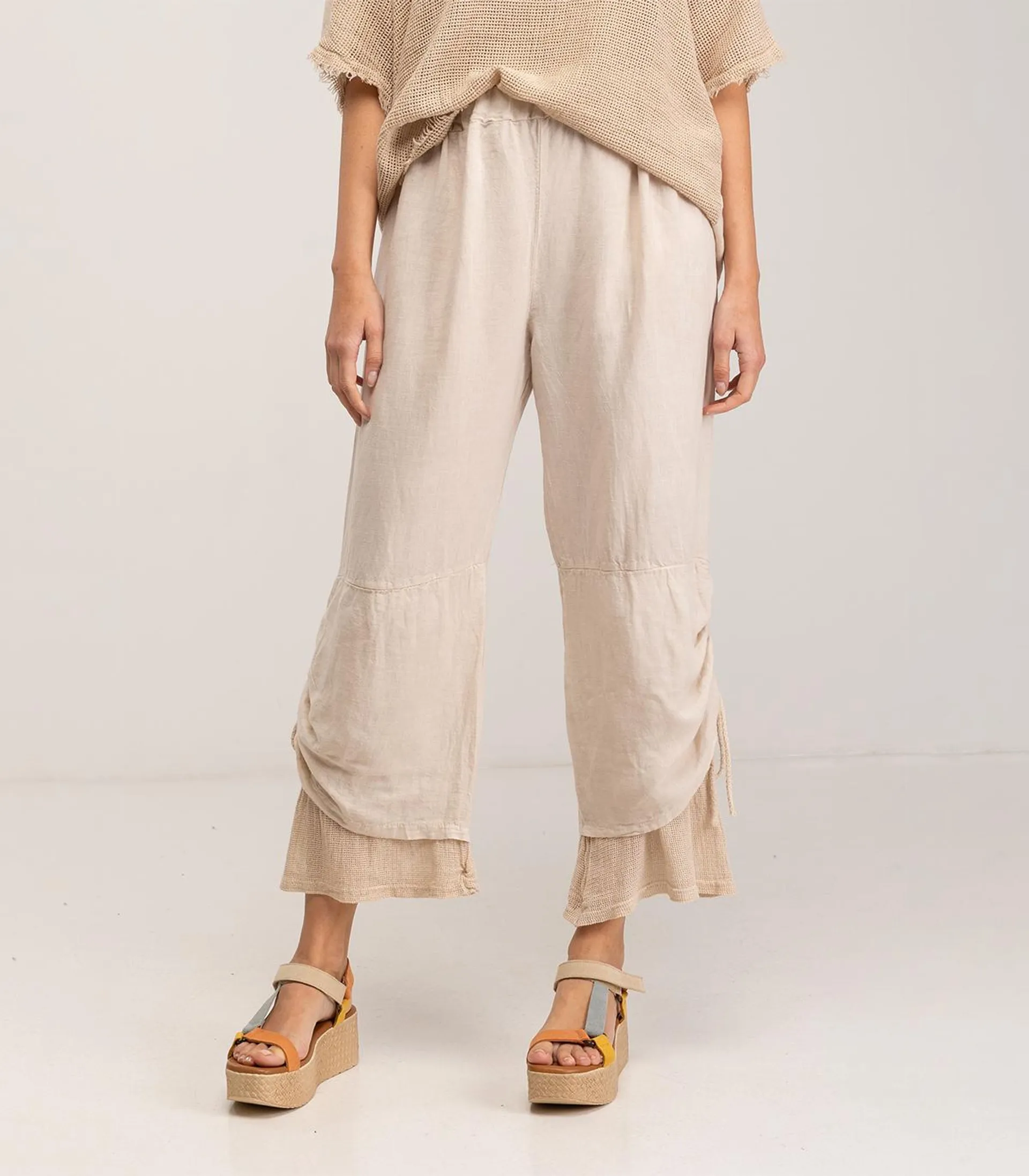Pantalon ancho en mezcla de lino y algodón de tiro alto y cintura elástica con cordón ajustable en el bajo Beige