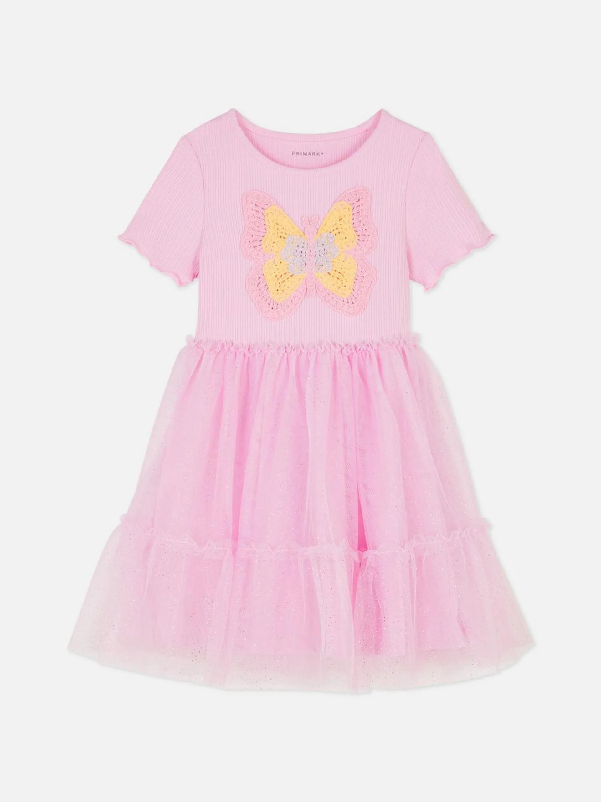 Vestido de crochet con tutú y mariposa