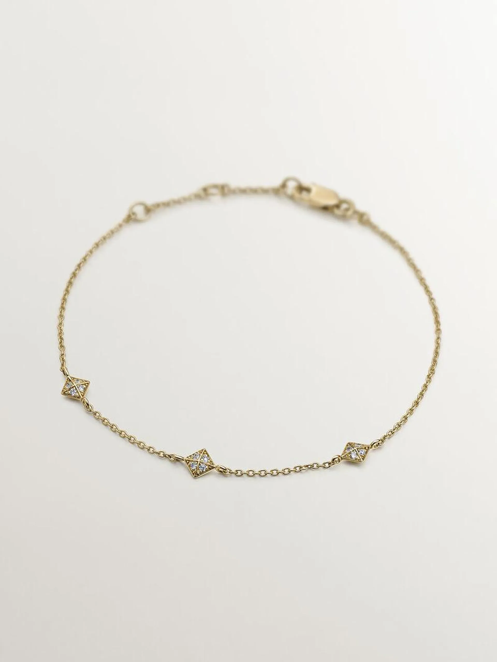 Pulsera de oro amarillo de 18K con formas geométricas y diamantes