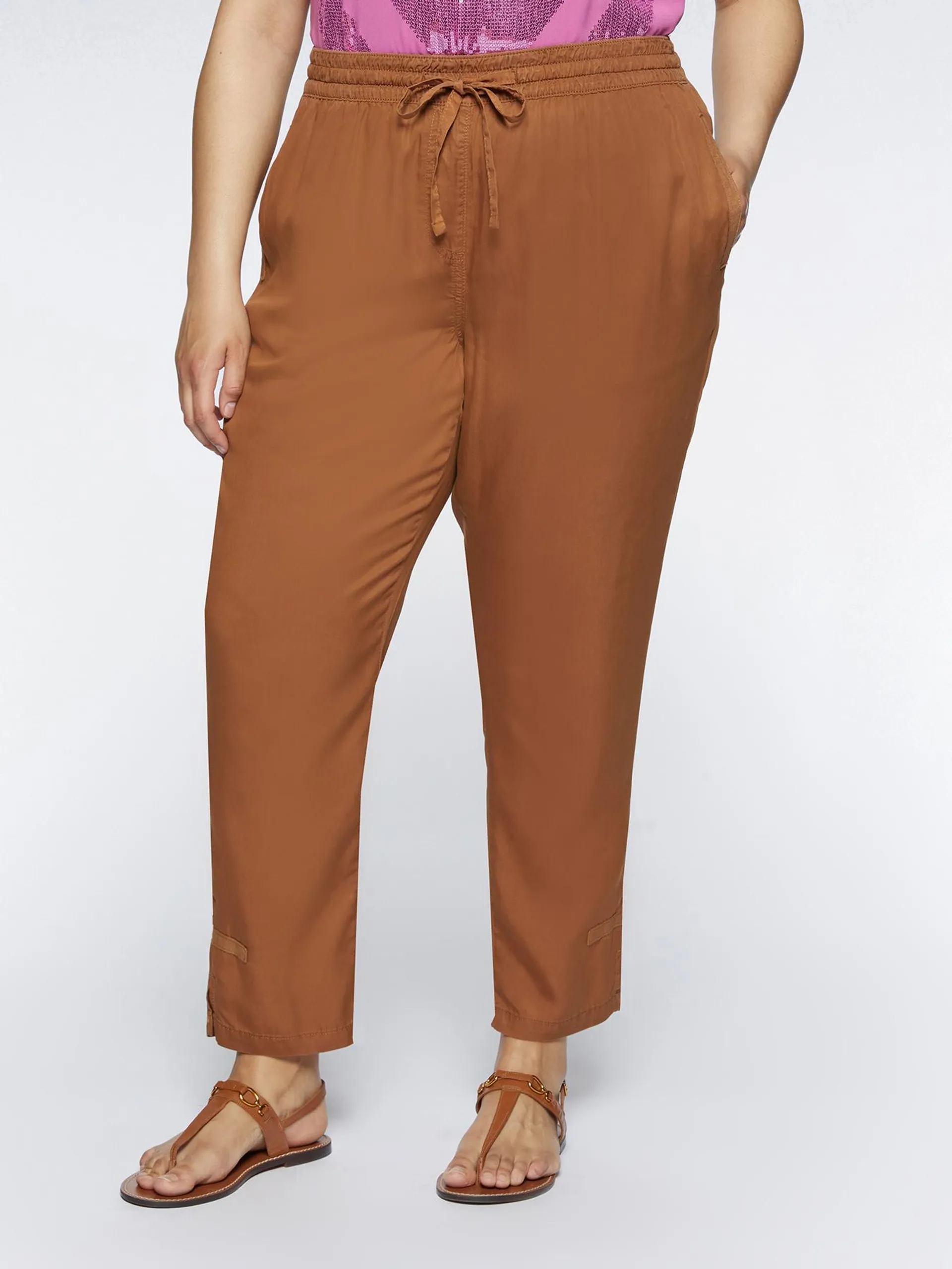 Pantaloni carrot con lacci in vita