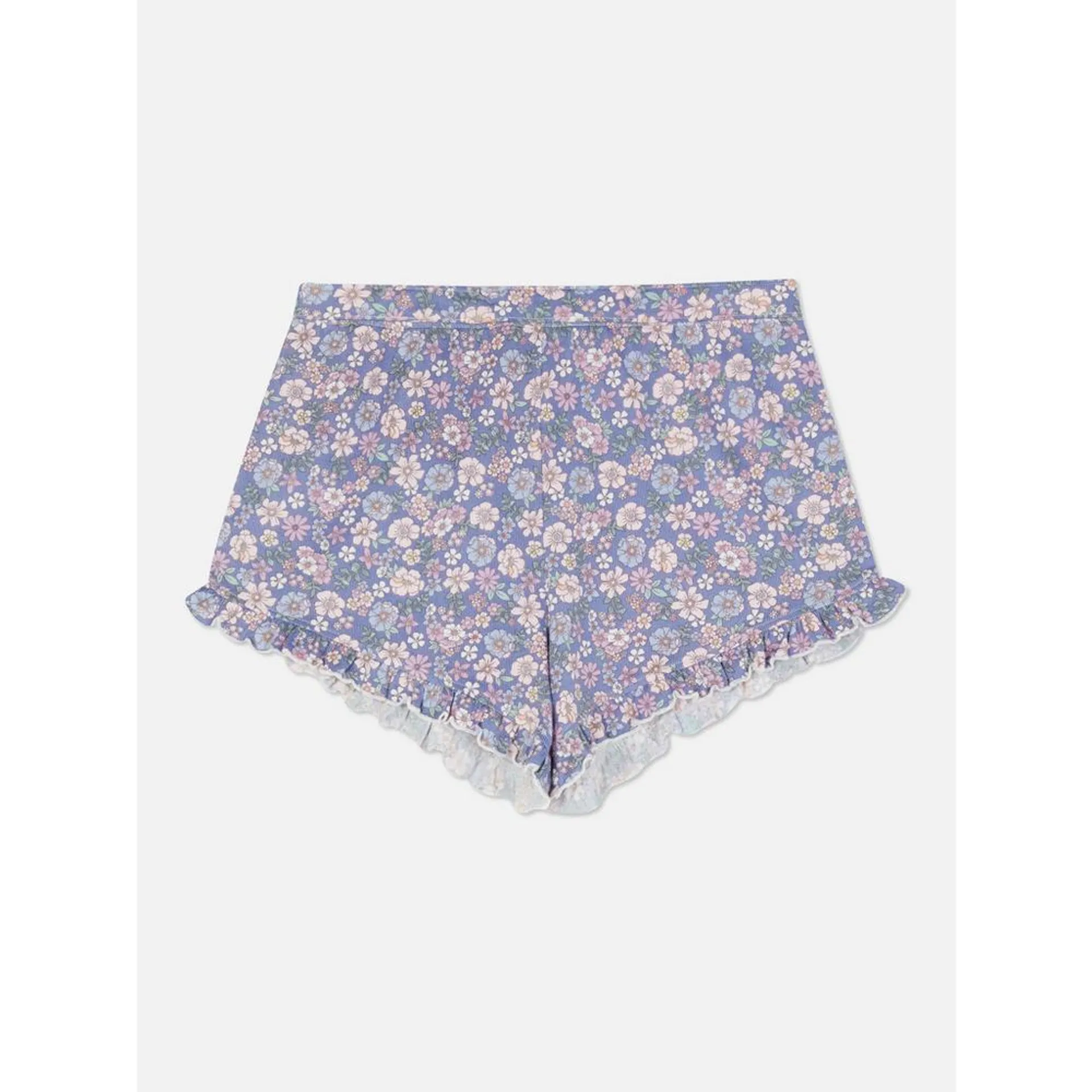 Pantalón corto de pijama de punto con estampado floral y borde ondulado