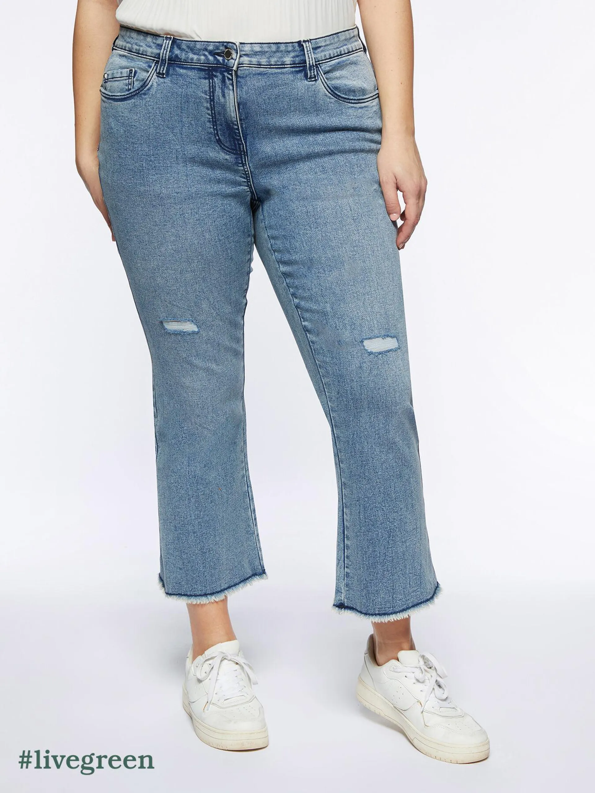 Jeans kick flare con strappi