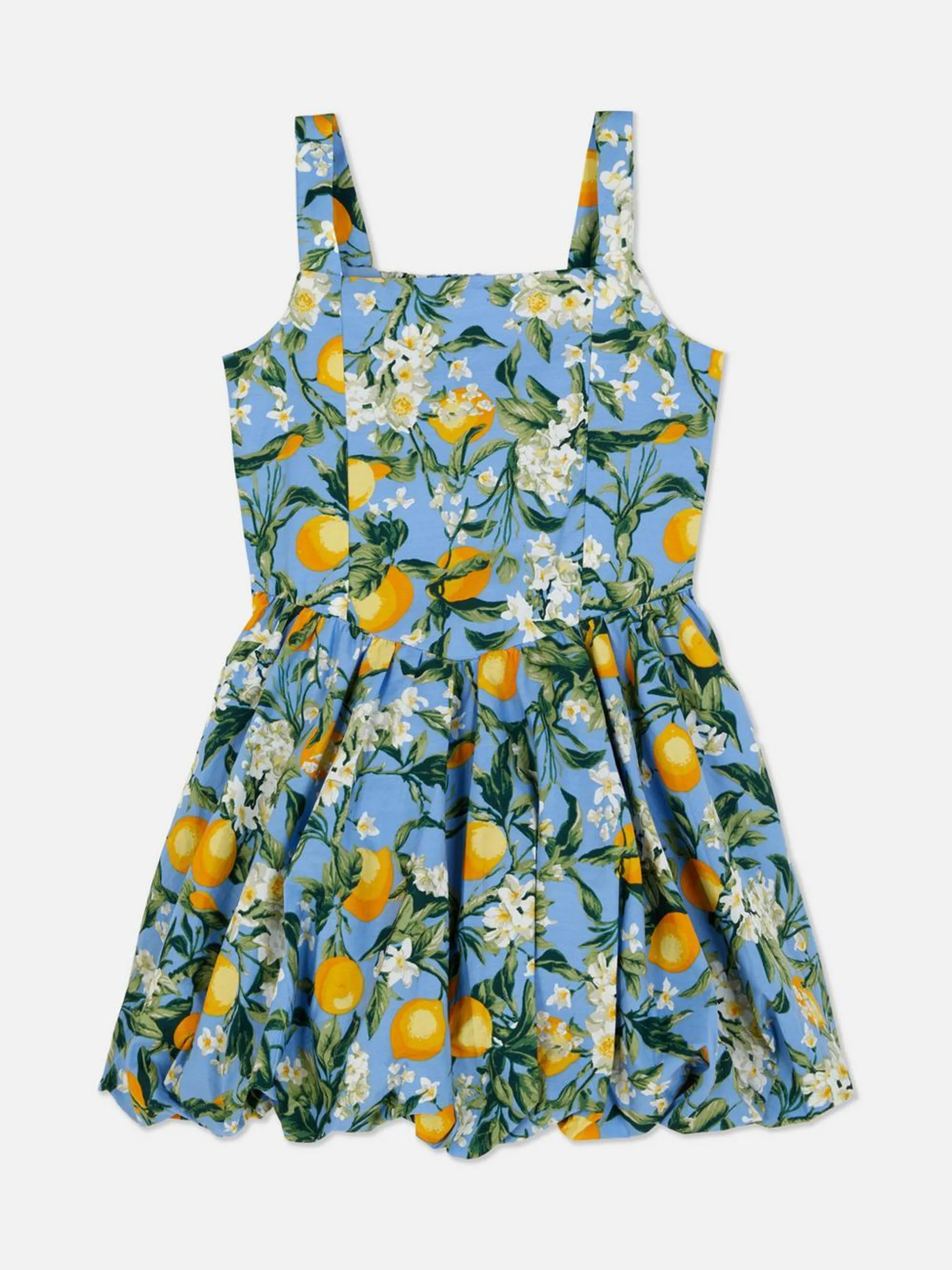 Vestido con bajo abullonado y estampado de limones
