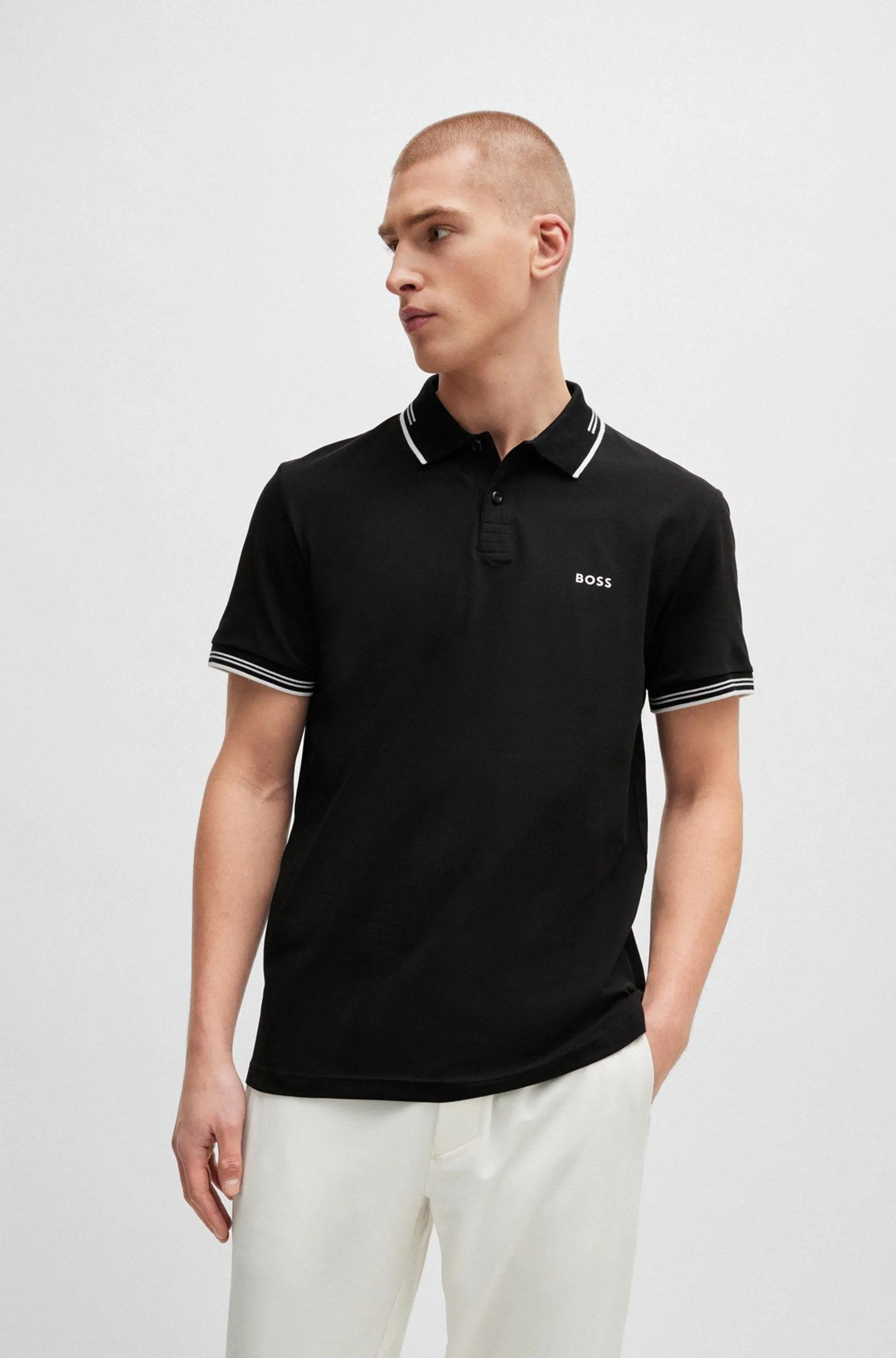 Polo slim fit de algodón elástico con detalles de la marca