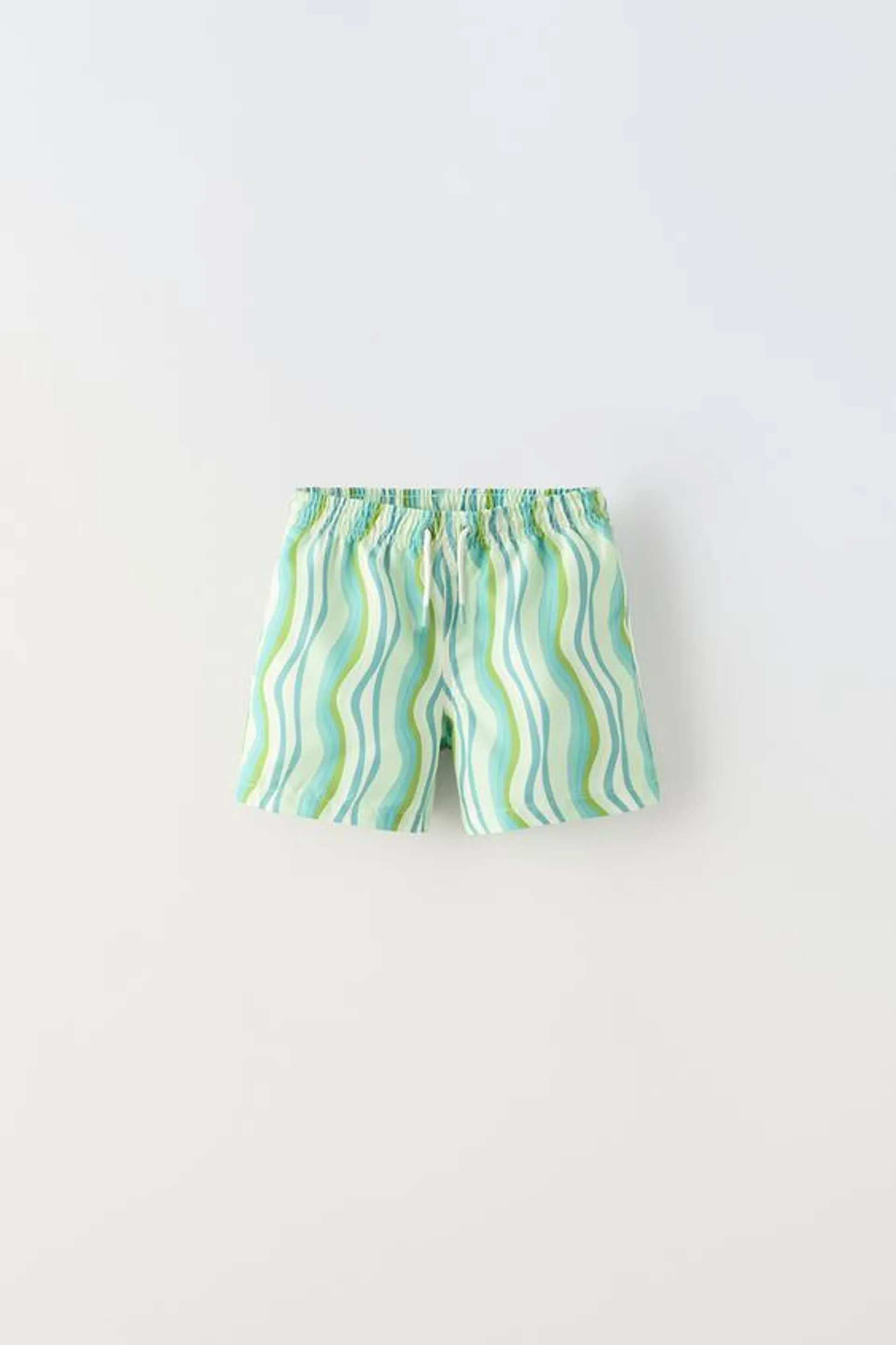 6-14 YEARS/ SWIM SHORTS WITH WAVY PRINT