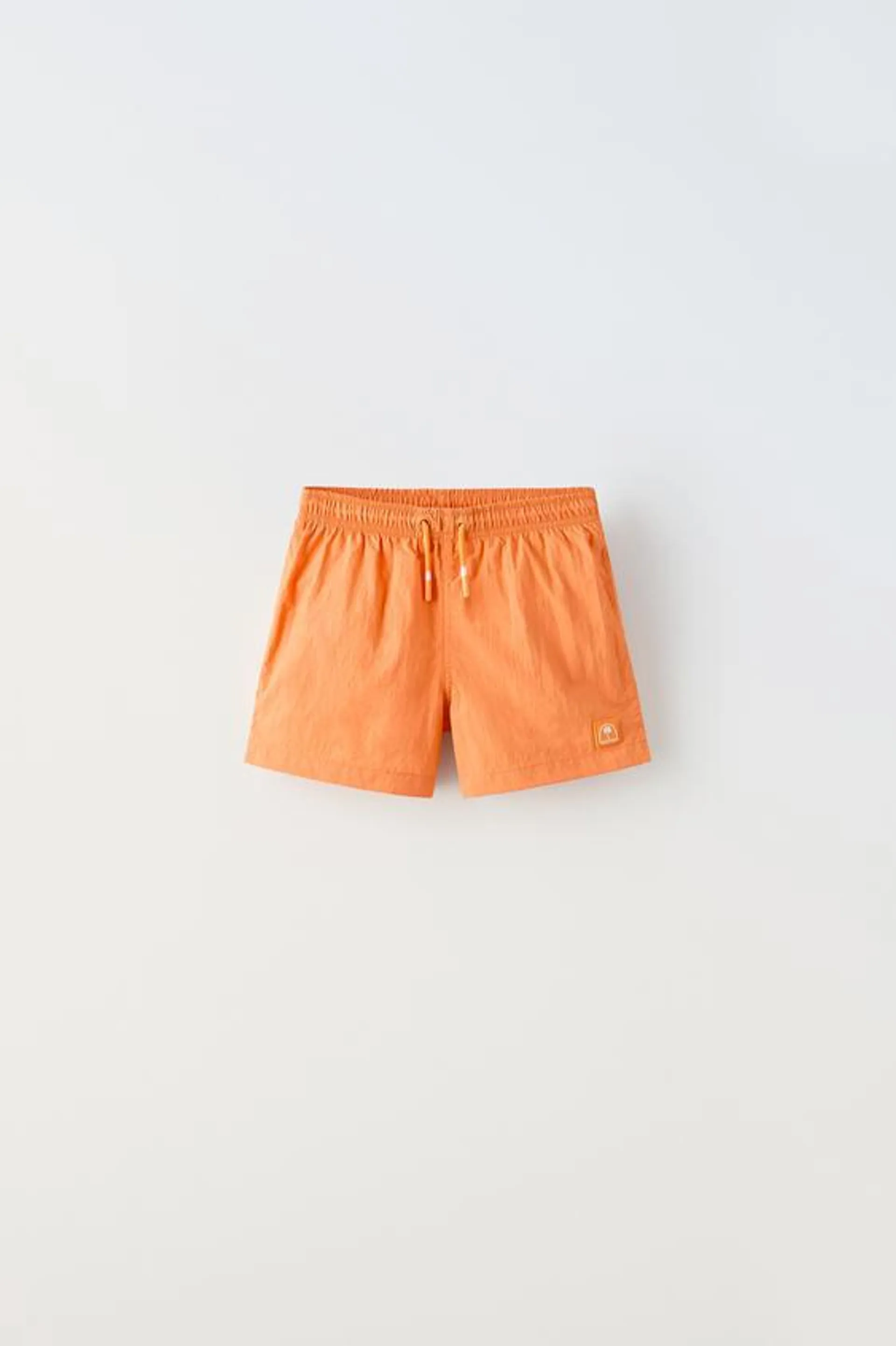 6-14 years/ PLAIN SWIM SHORTS WITH LABEL