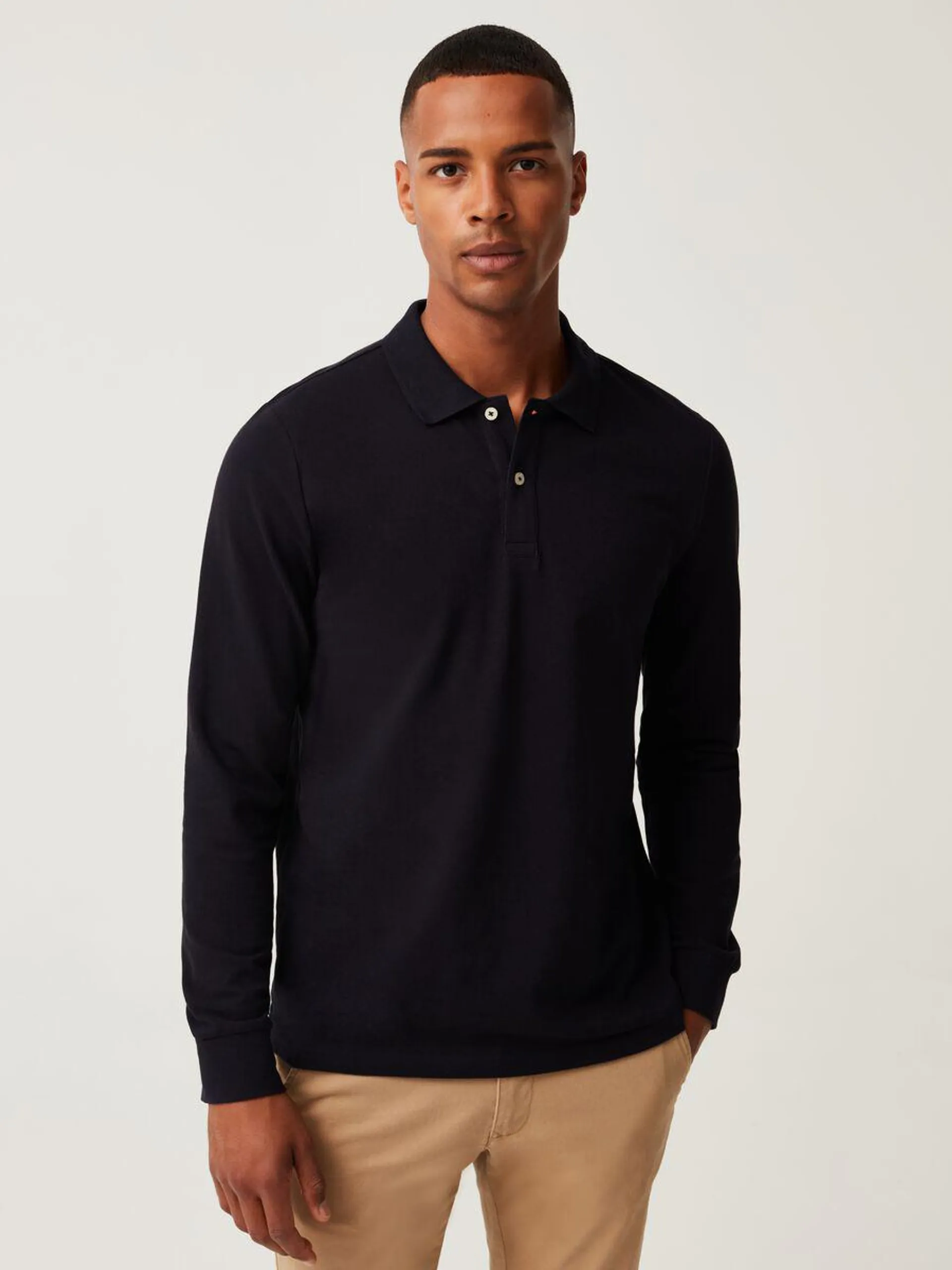 Cotton piquet polo shirt with long sleeves.