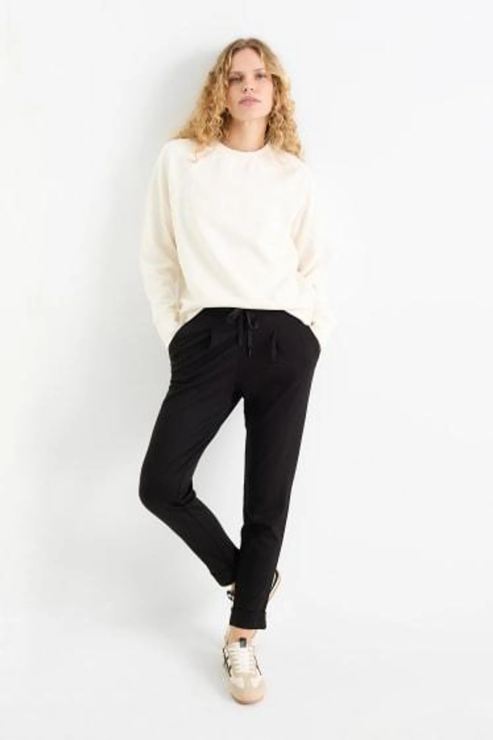 Jersey trousers - mid-rise waist - tapered fit