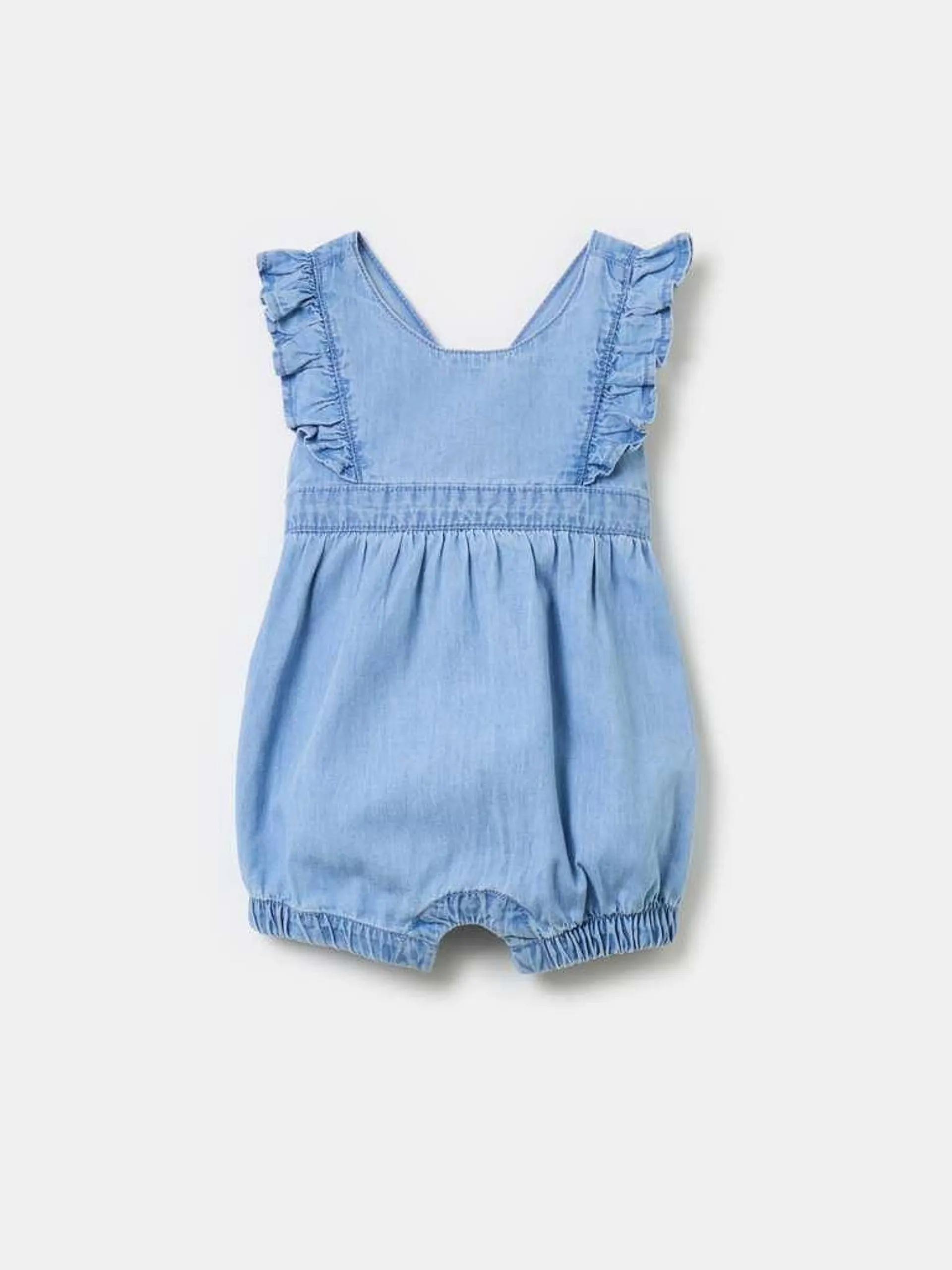 Denim romper suit with frills Décoloration légère