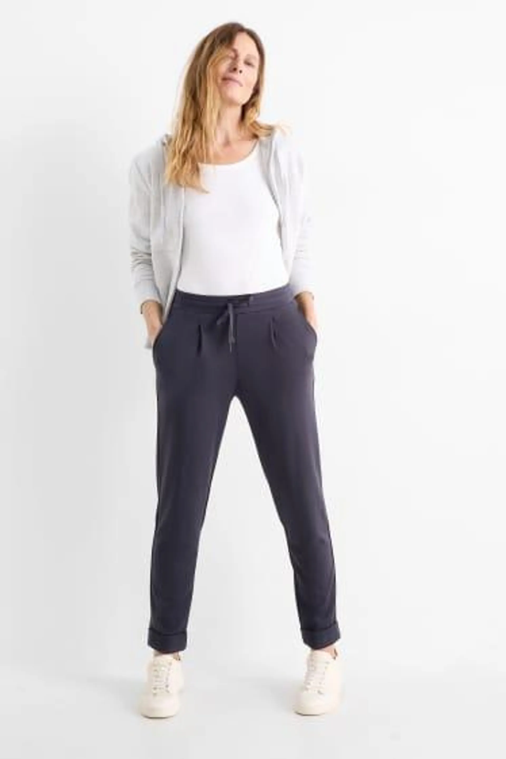 Jersey trousers - mid-rise waist - tapered fit