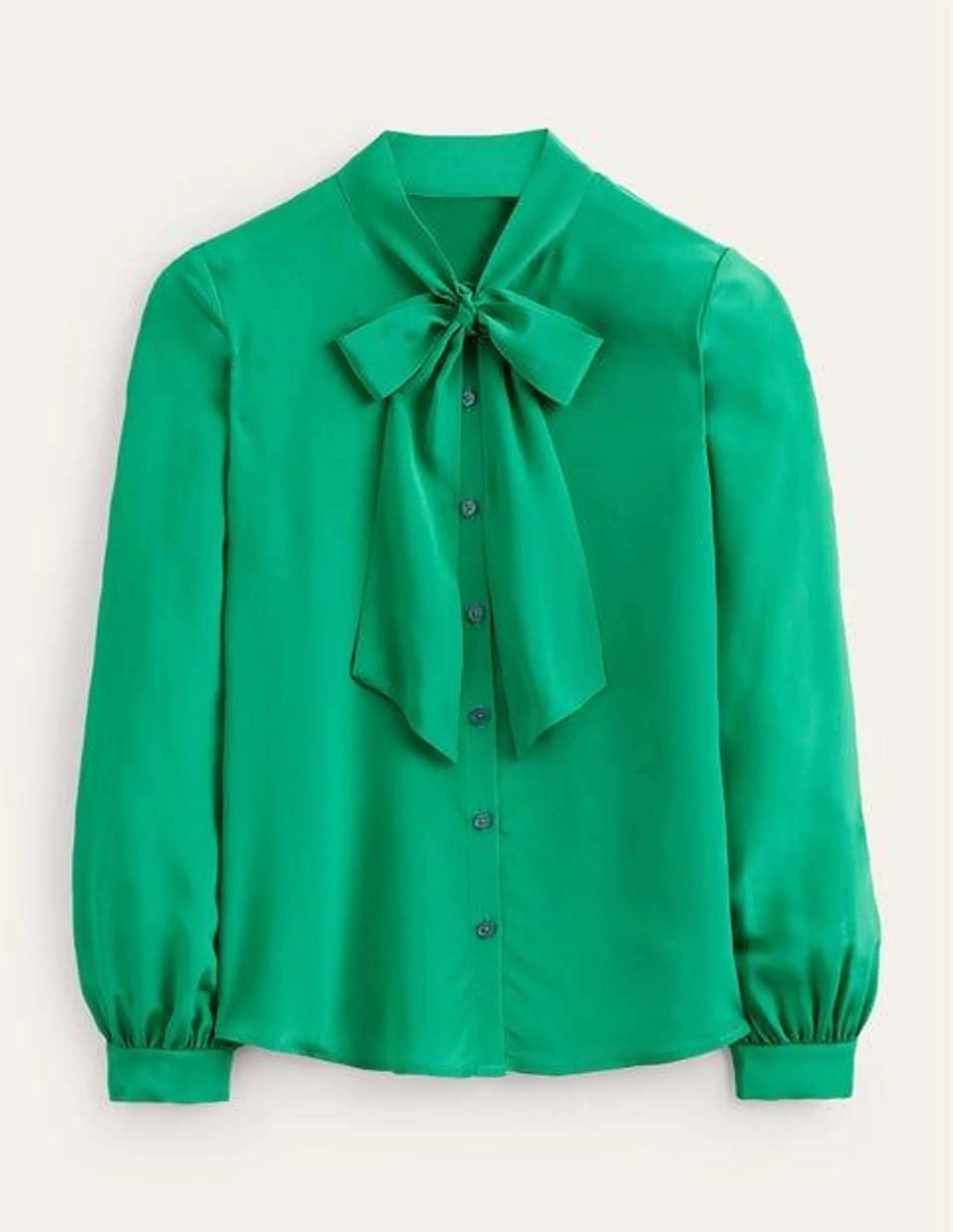 Blouse boutonnée et nouée au col