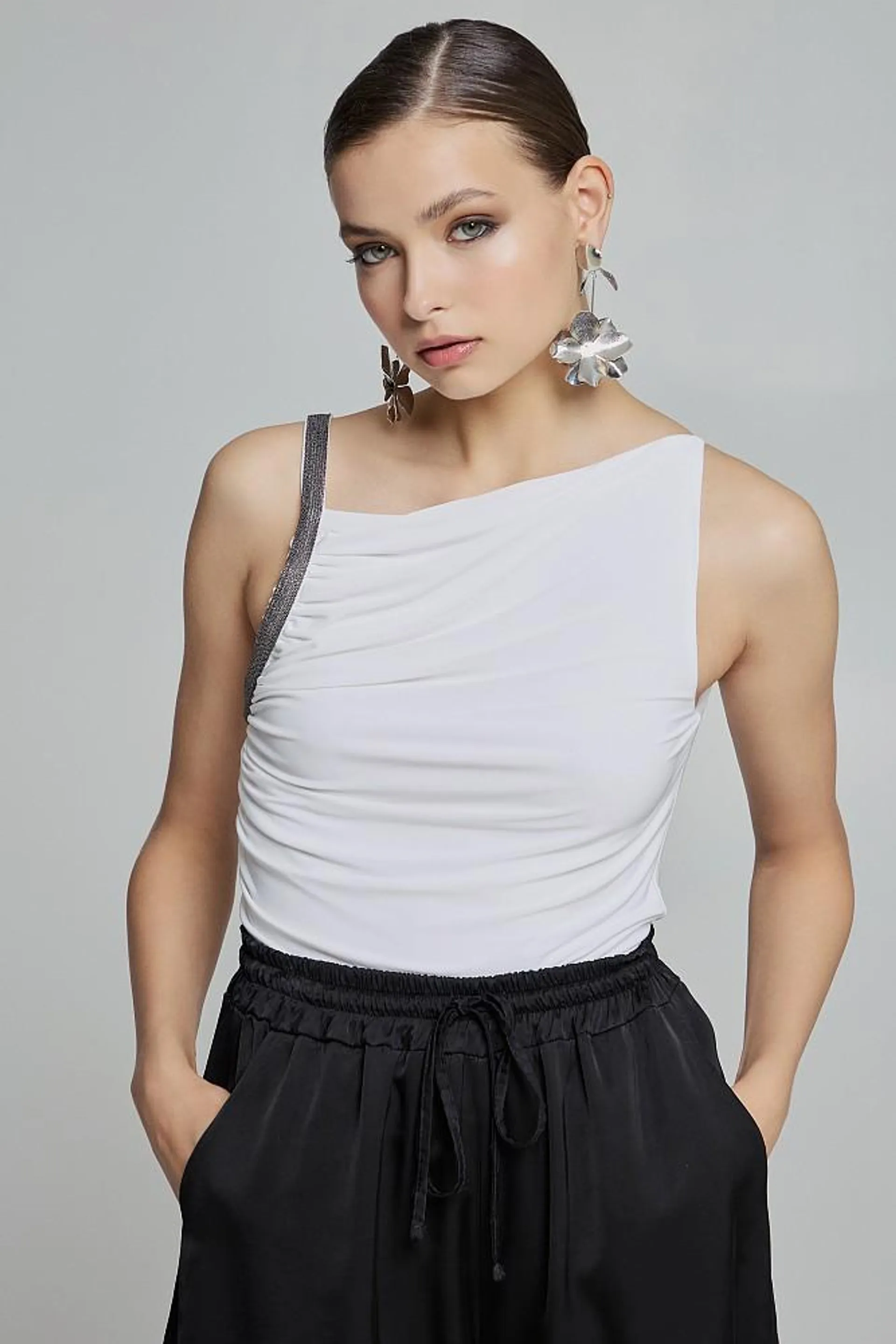 Top with asymmetric neckline