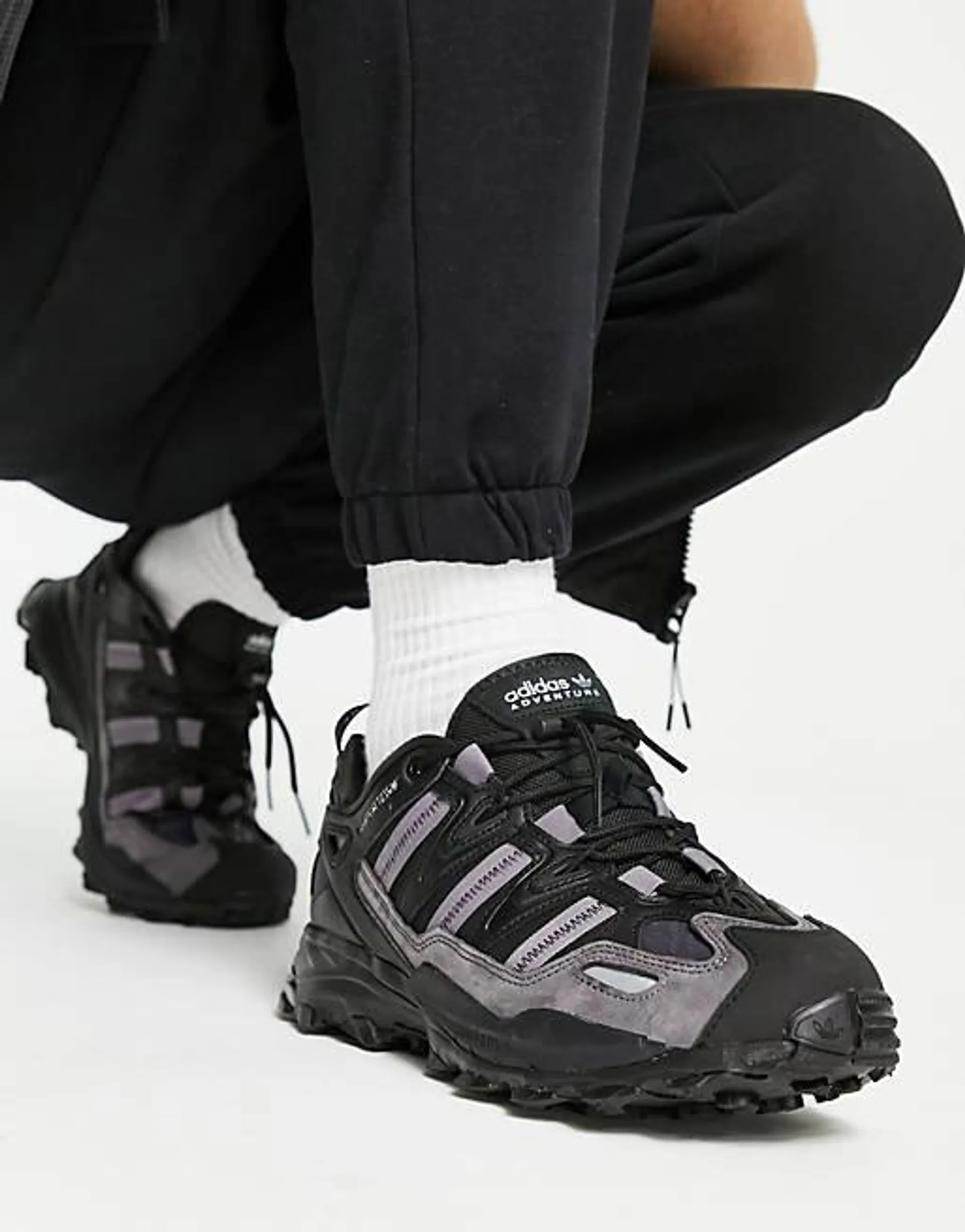 adidas Originals Hyperturf trainers in triple black