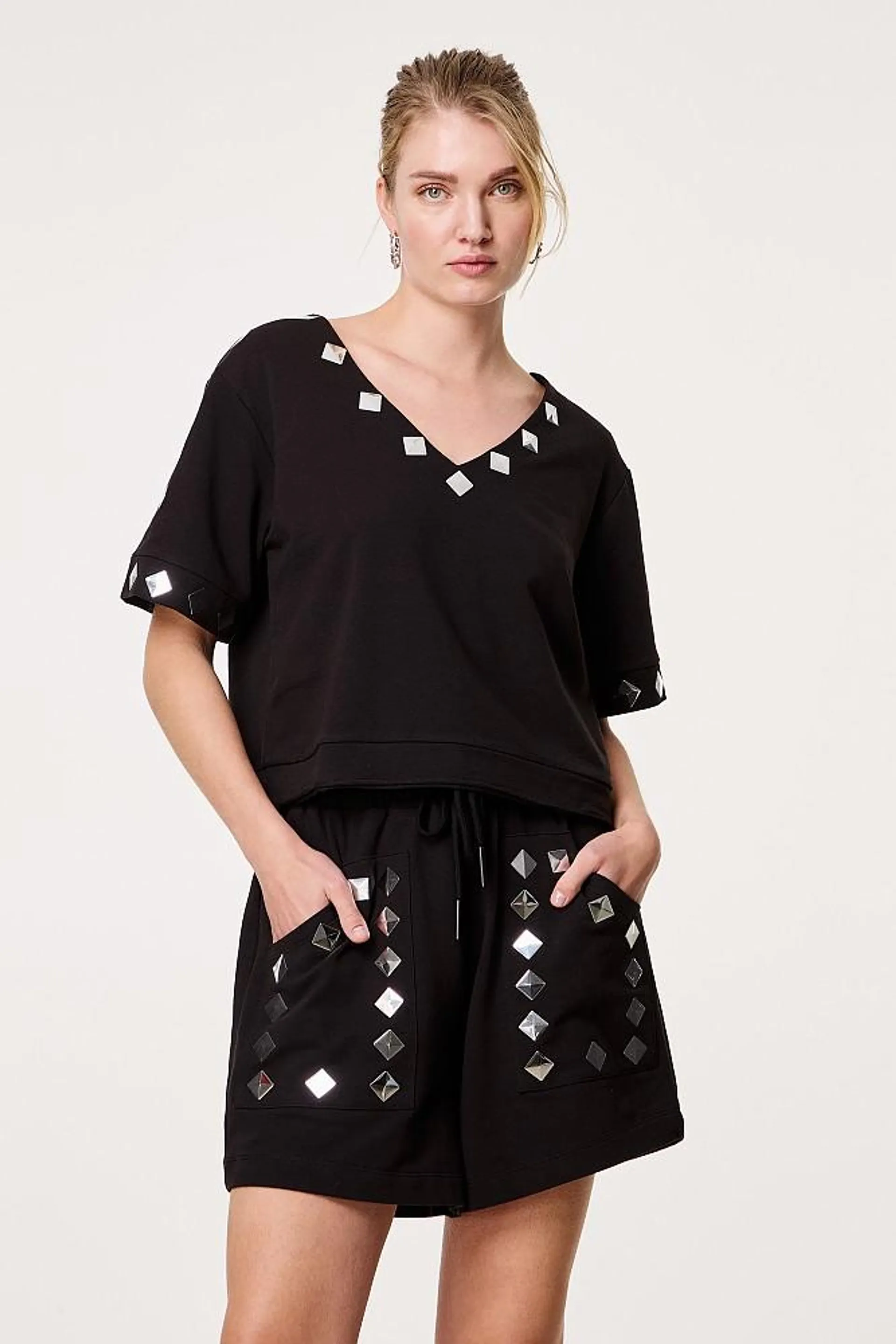 Blouse with studs