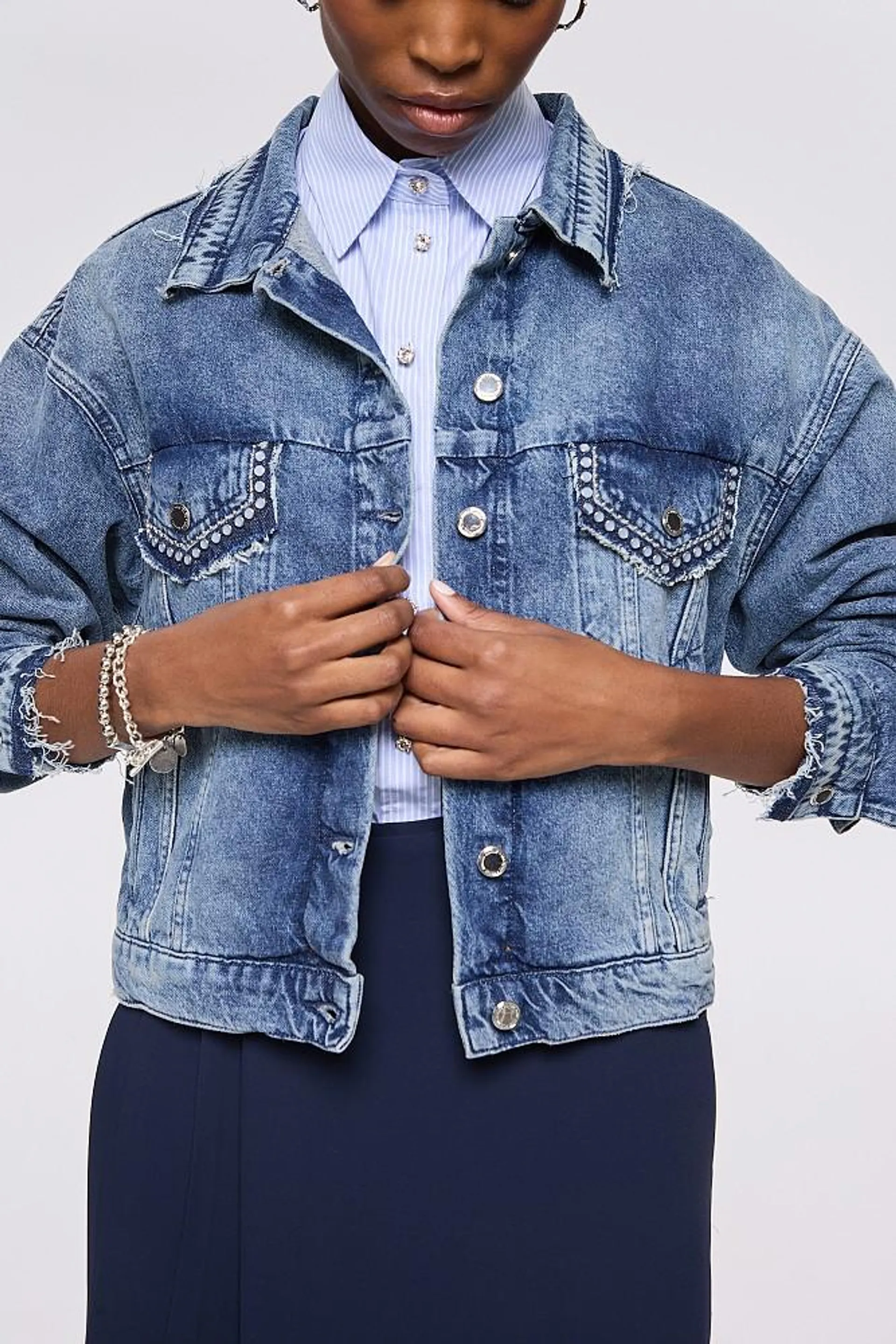 Denim jacket with studs