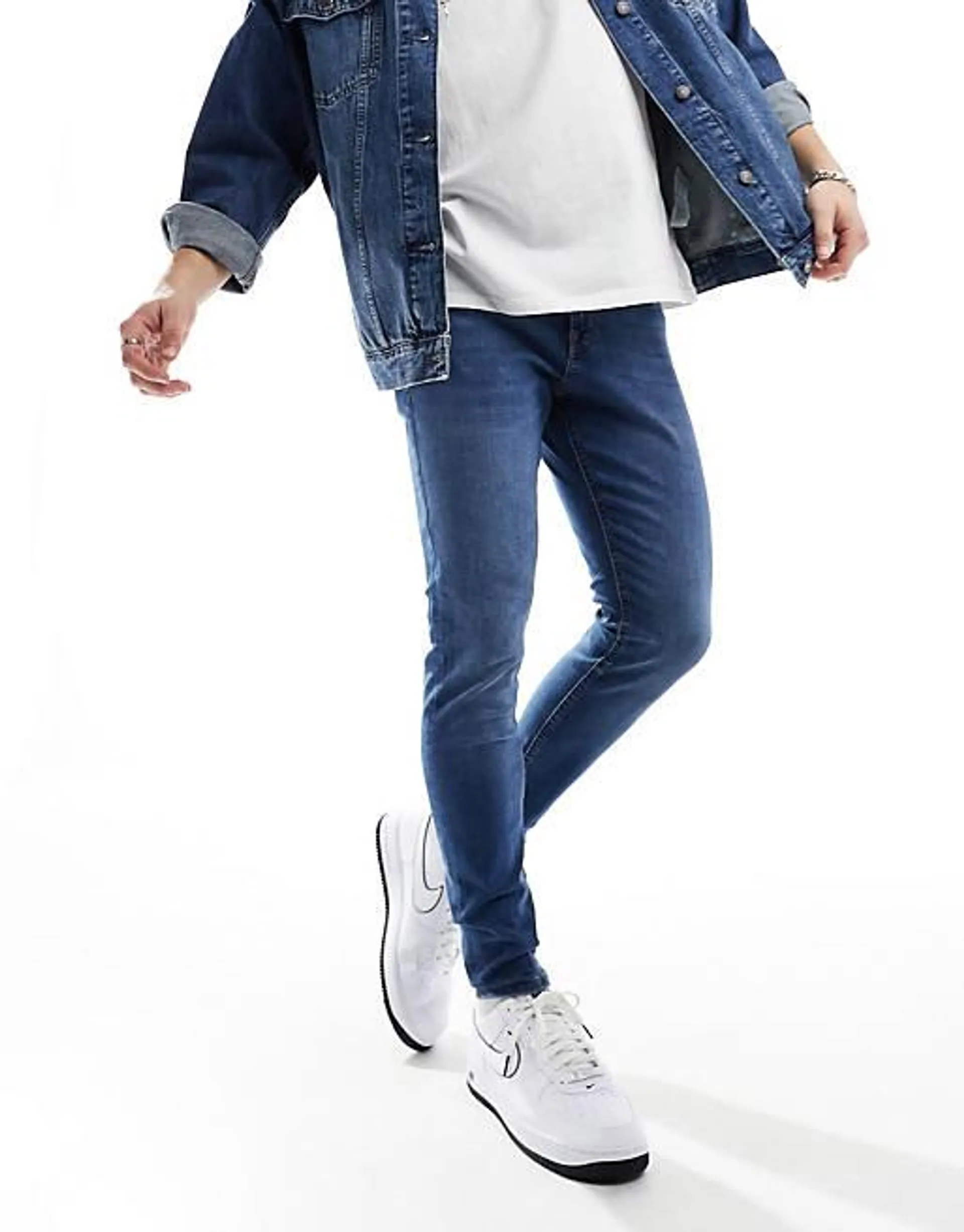 Jack & Jones pete tapered jeans in mid blue