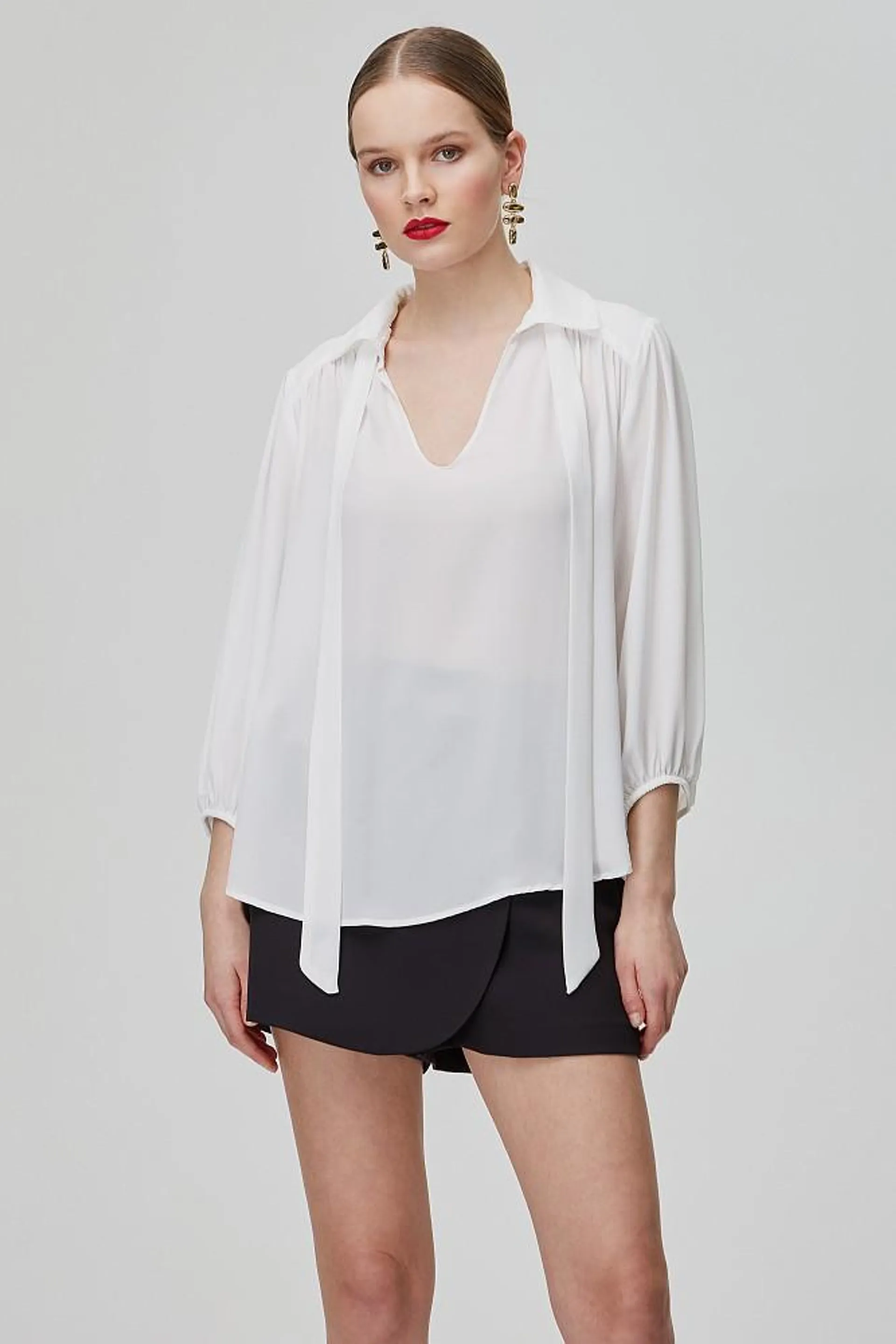 Blouse with self-tie