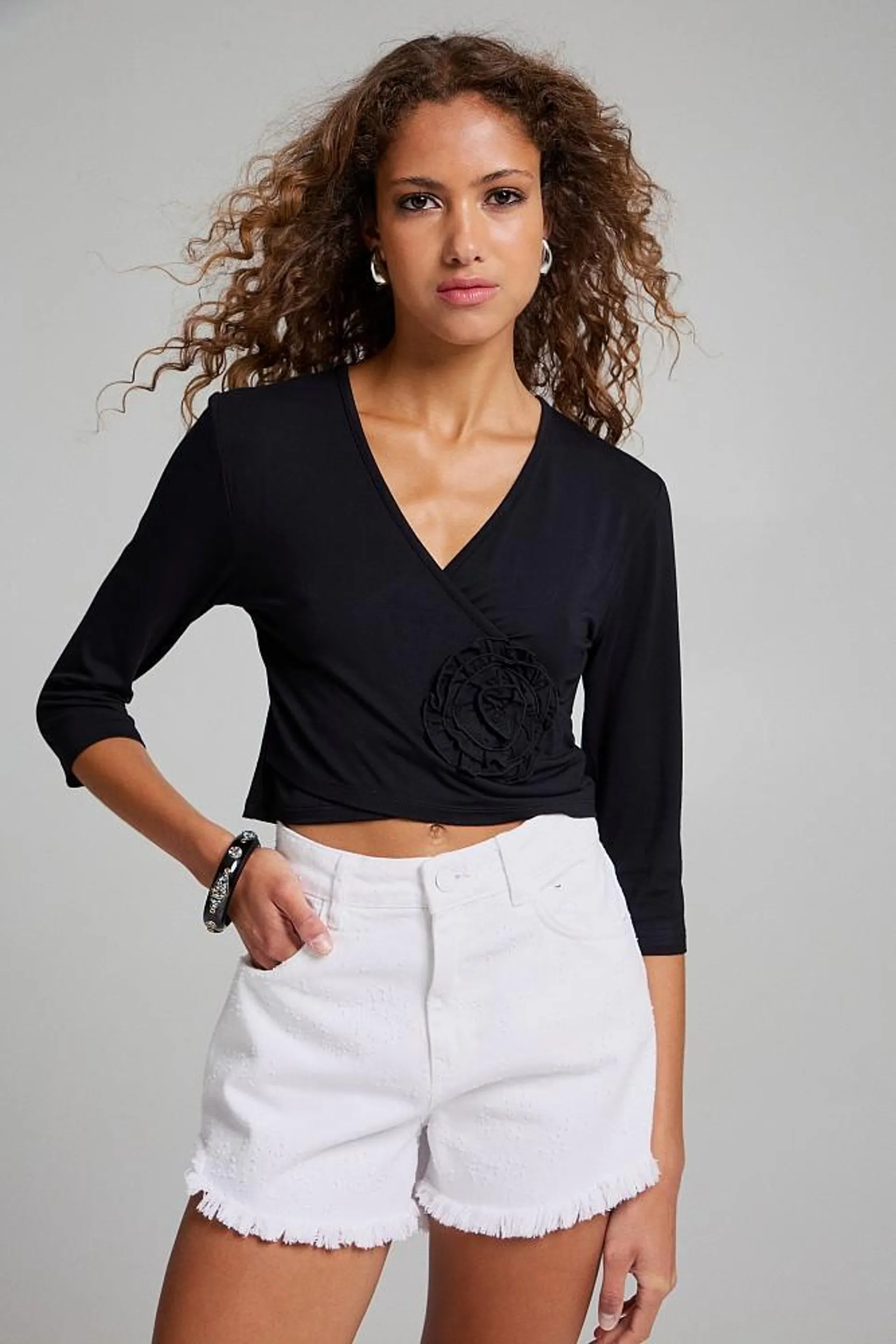 Wrap top with applique flower