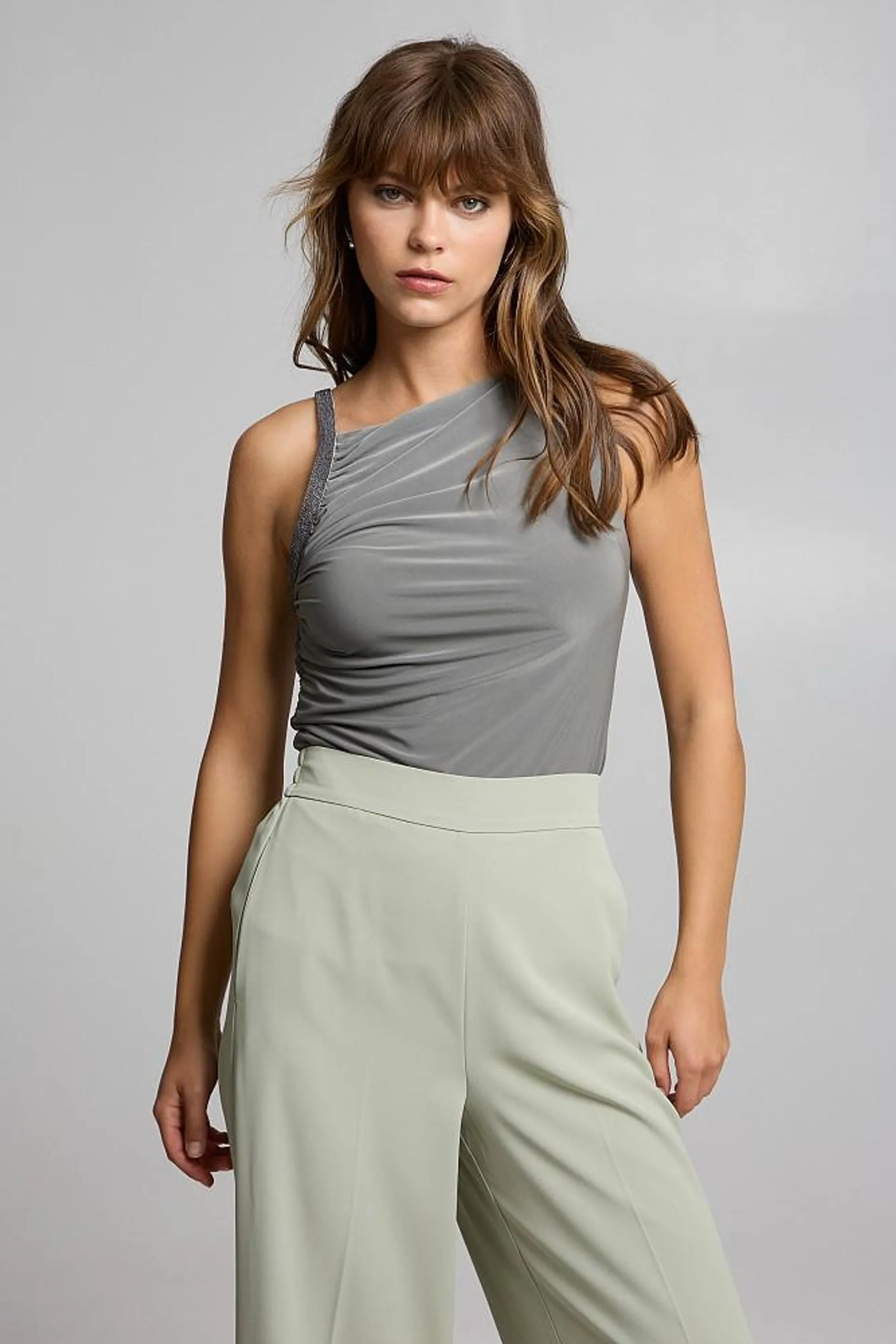 Top with asymmetric neckline