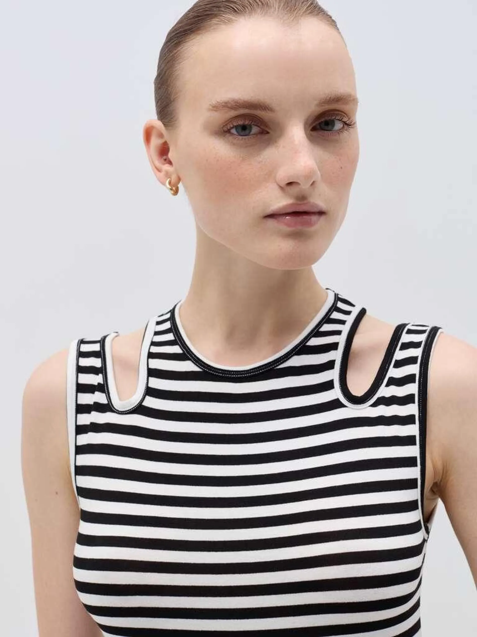 White/Black Striped tank top with cut-out details