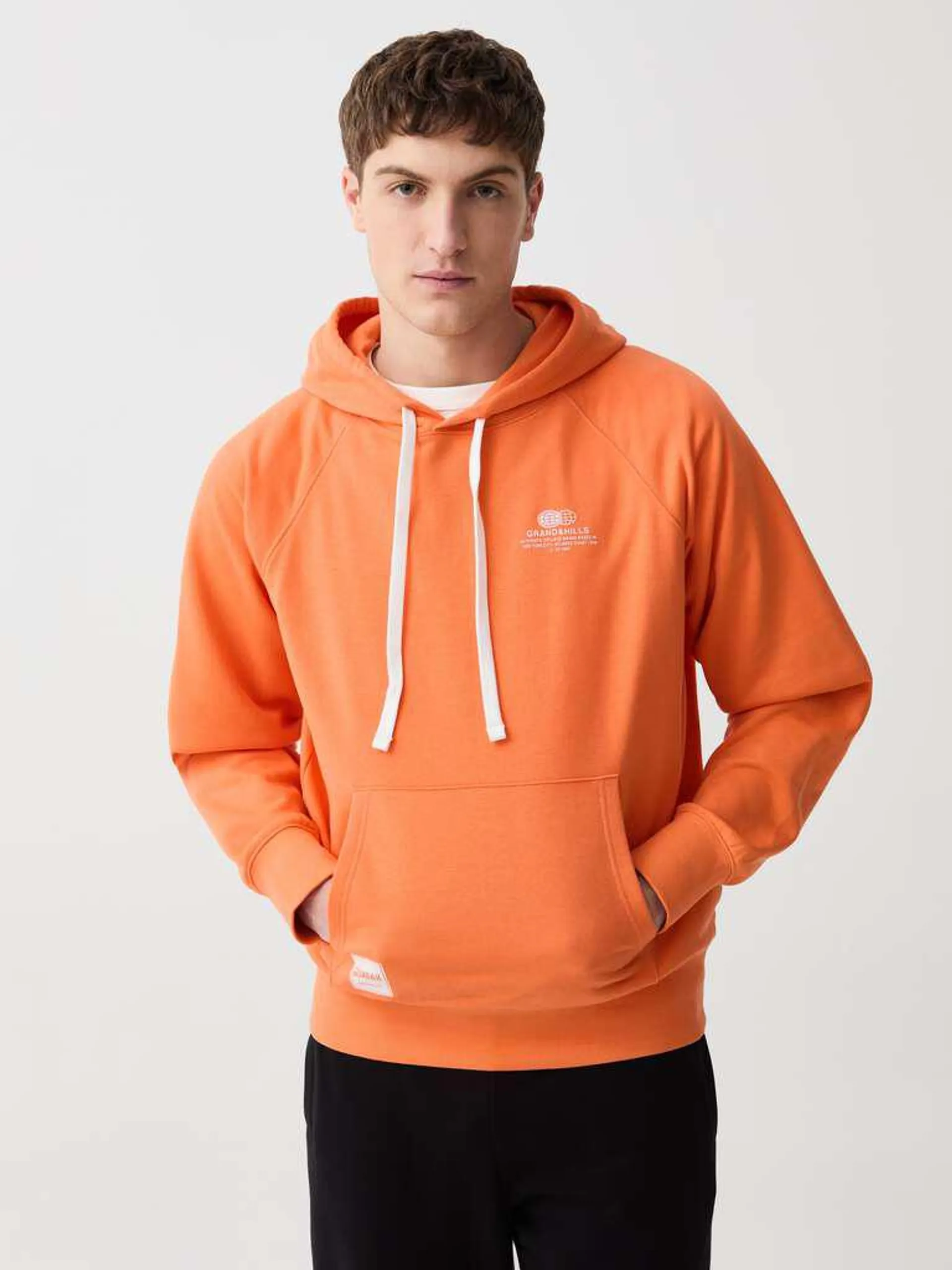 Orange Oversized sweatshirt with hood and pocket