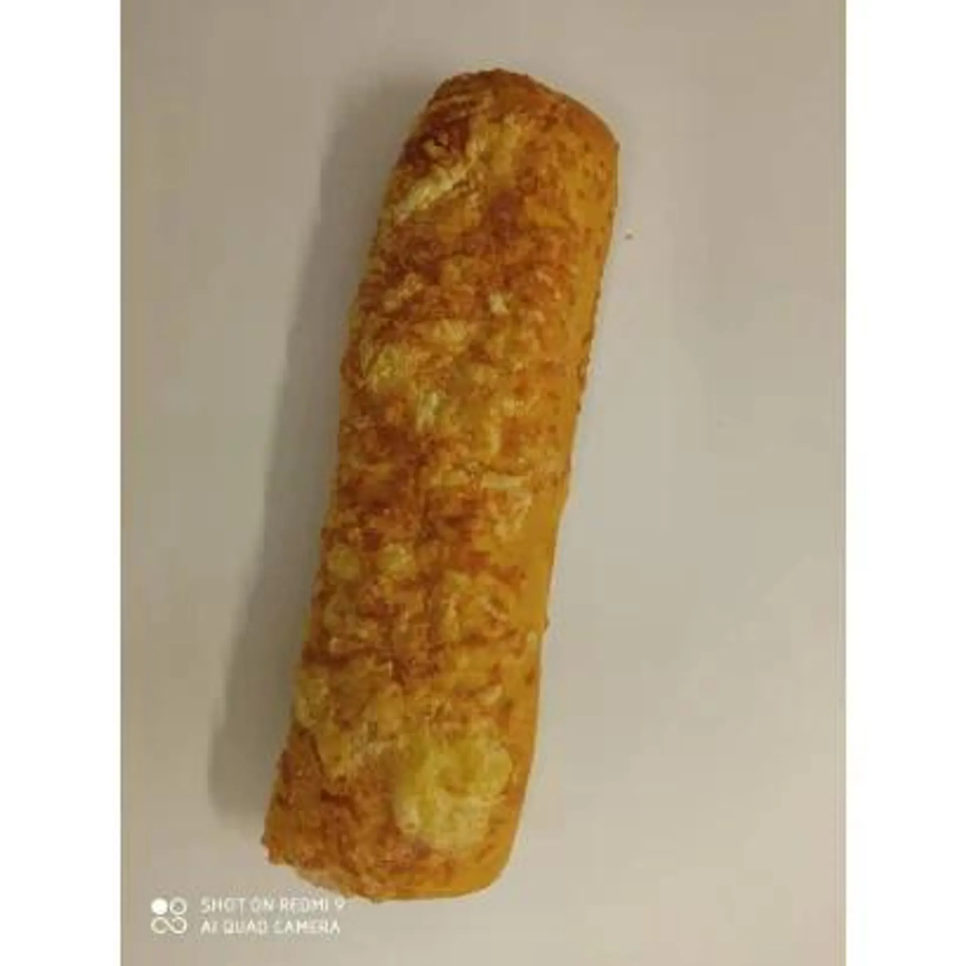 Prebaked-quickfrozen cheesy baguette