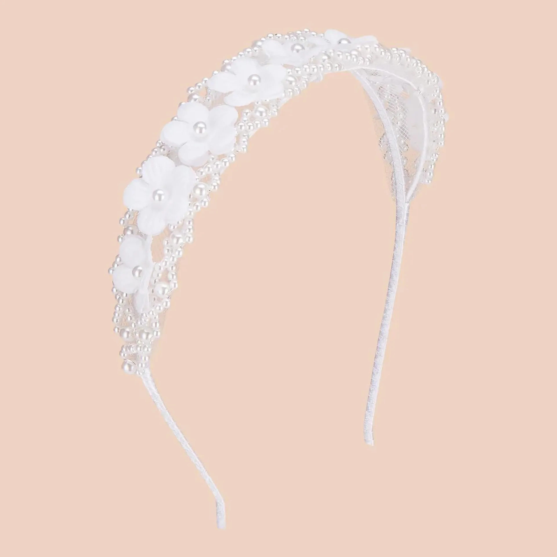 CELEBRATIONS AVAILABLE IN STORE Floral-Embellished Communion Headband €29.00