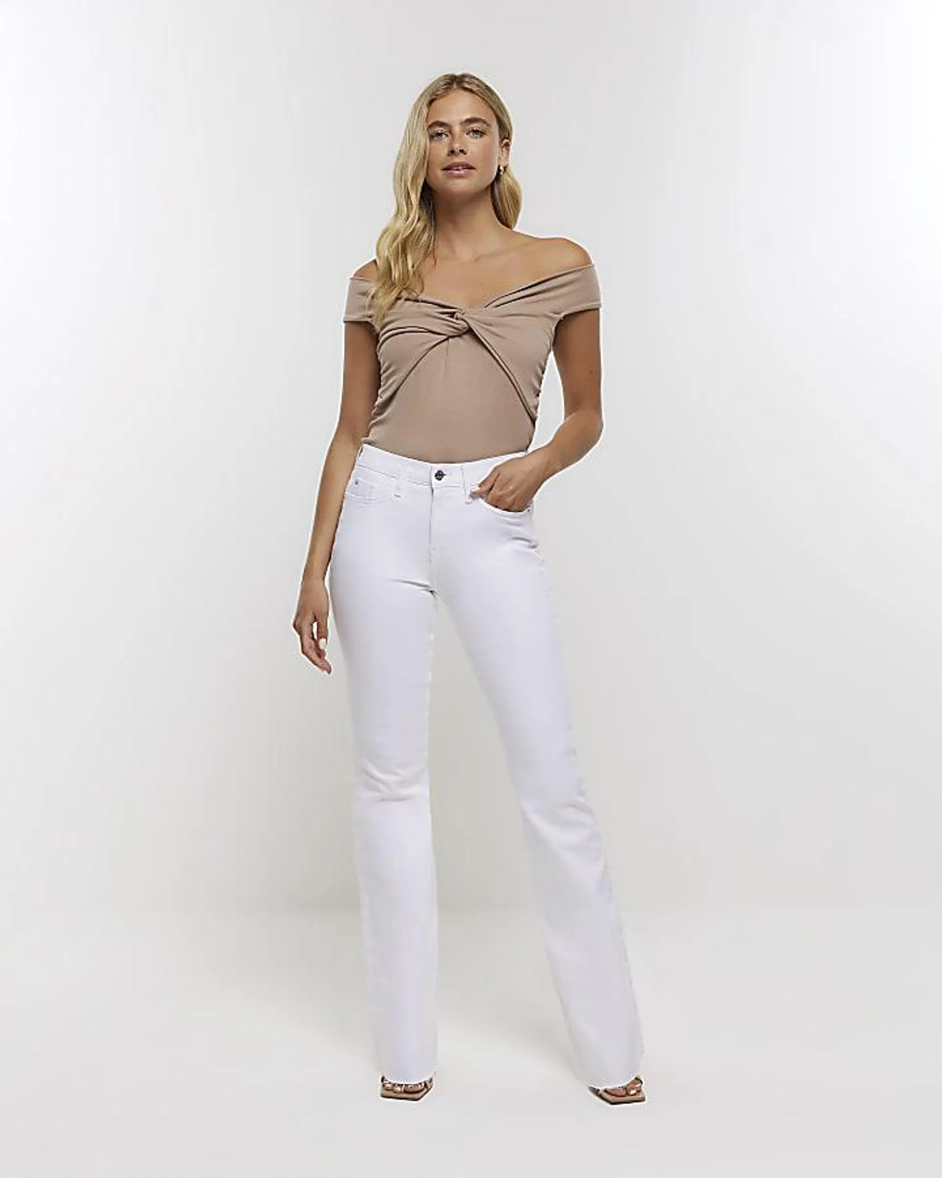 White mid rise flare jeans