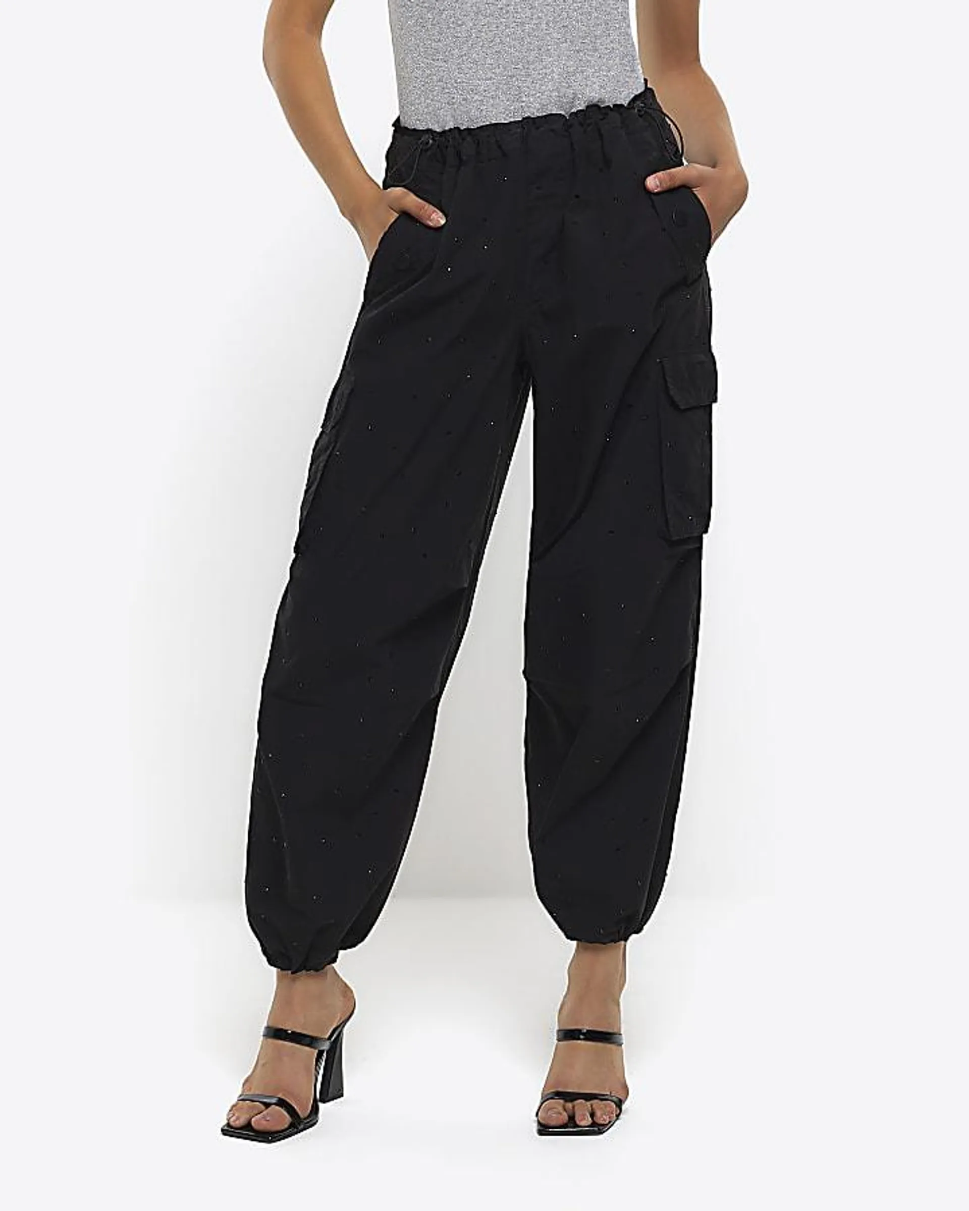 Black drawstring cuff parachute trousers