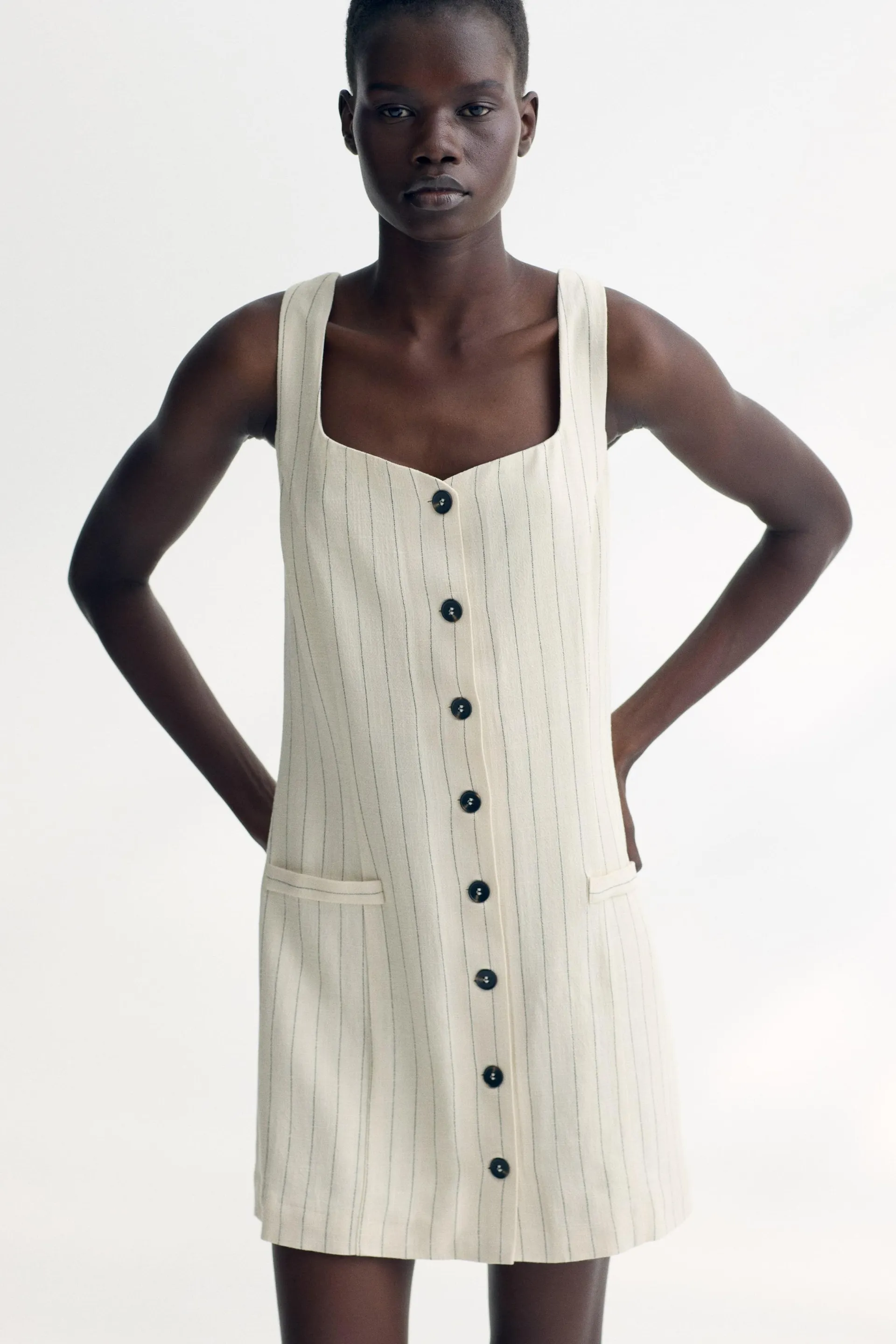 Sleeveless linen-blend dress