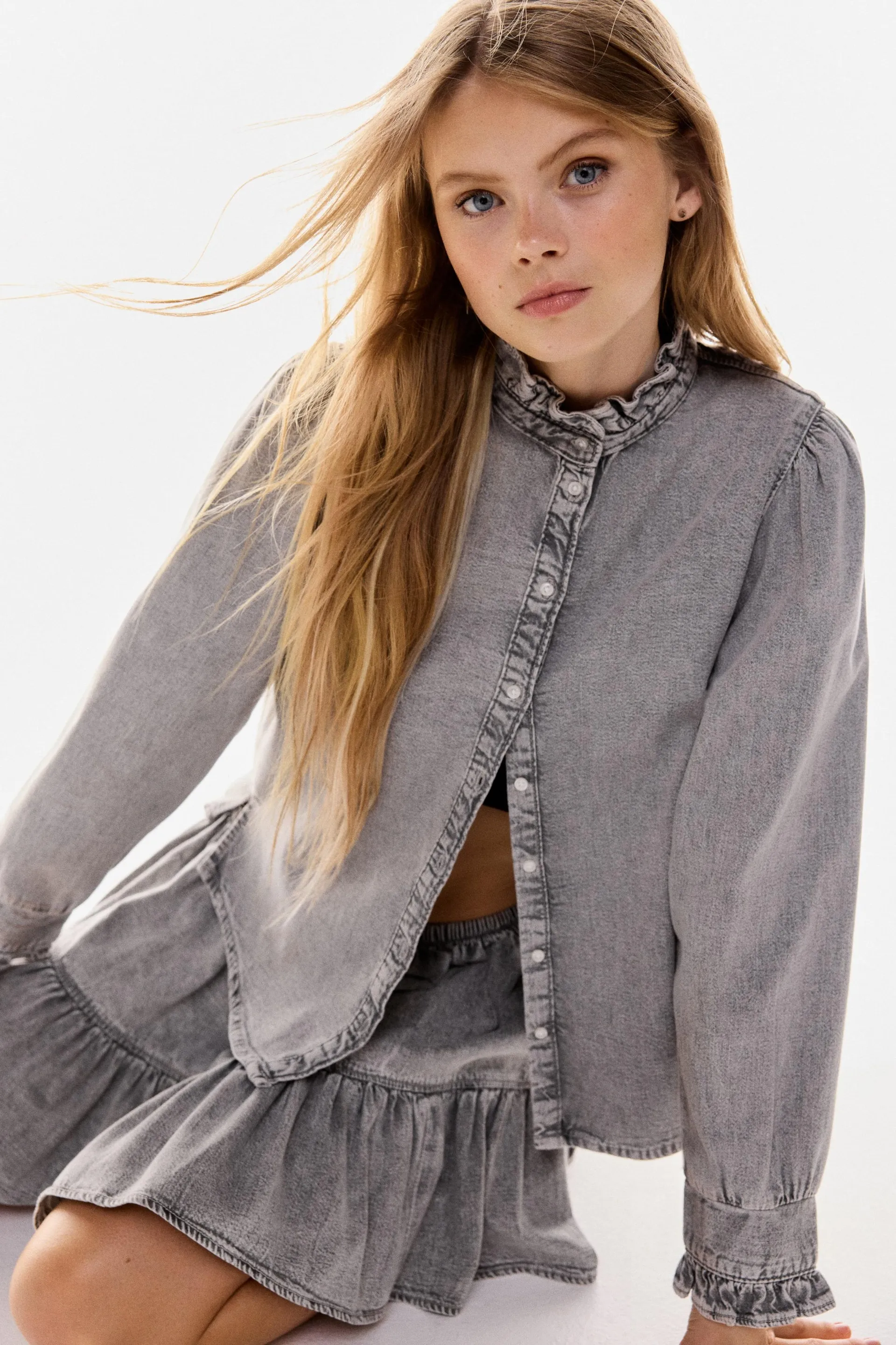Frill-trimmed denim blouse