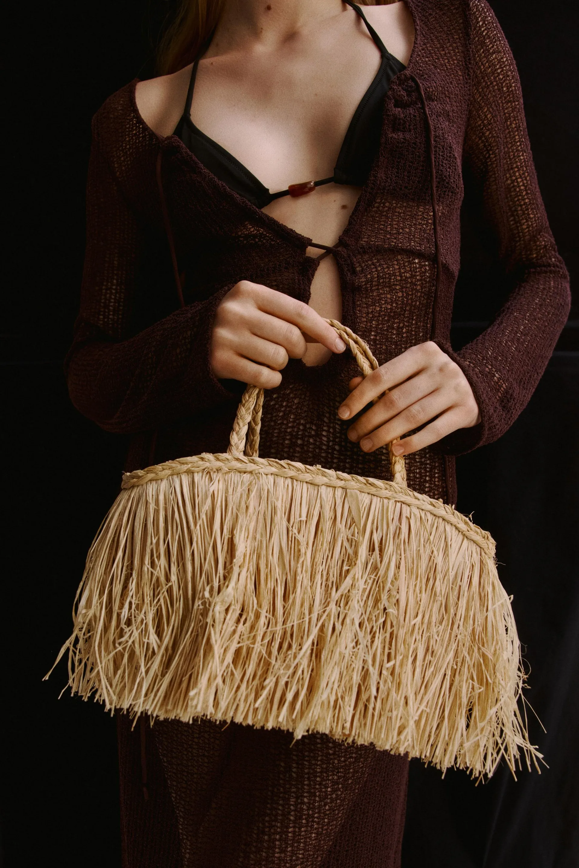 Fringed straw bag