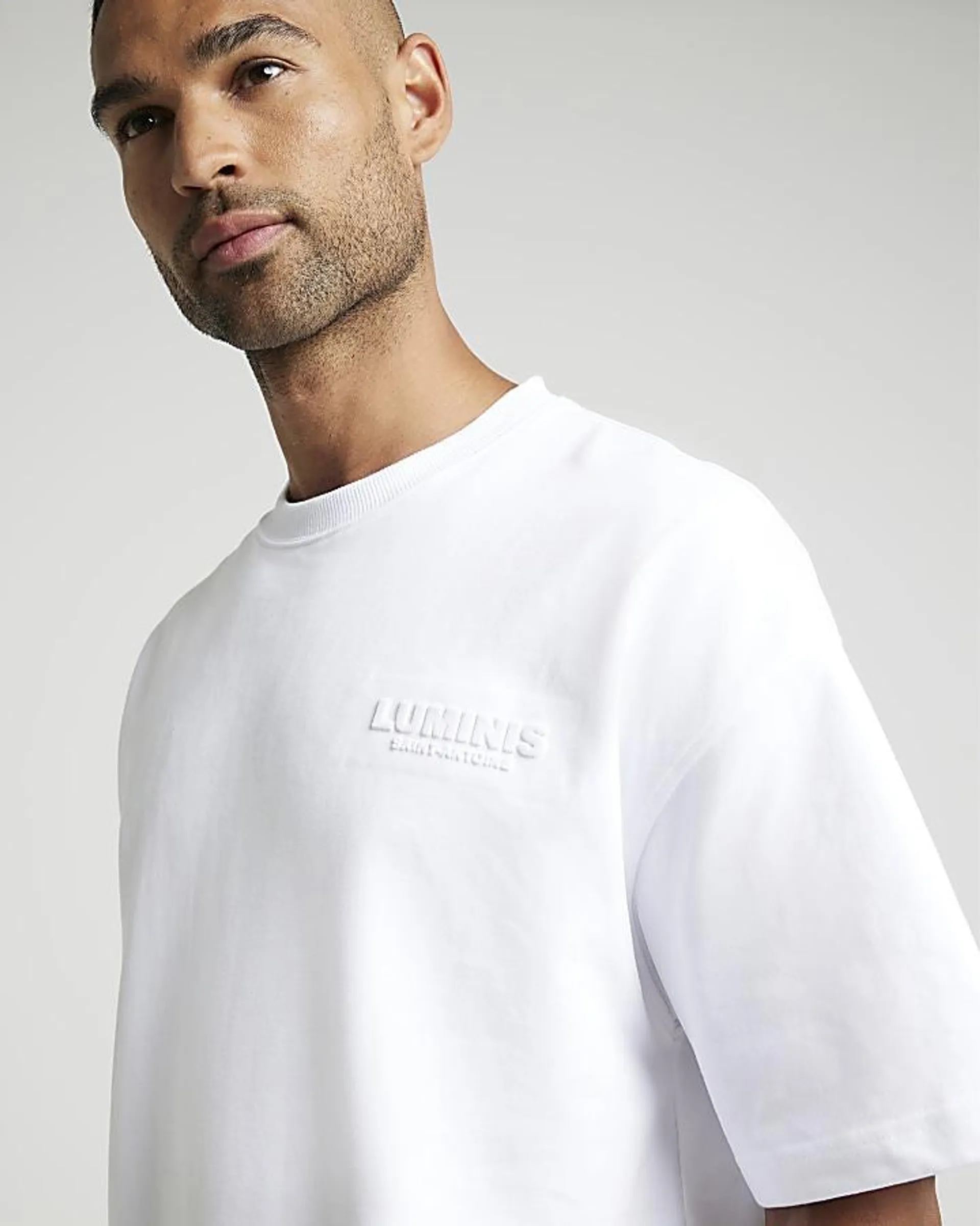 White oversized fit embossed print t-shirt