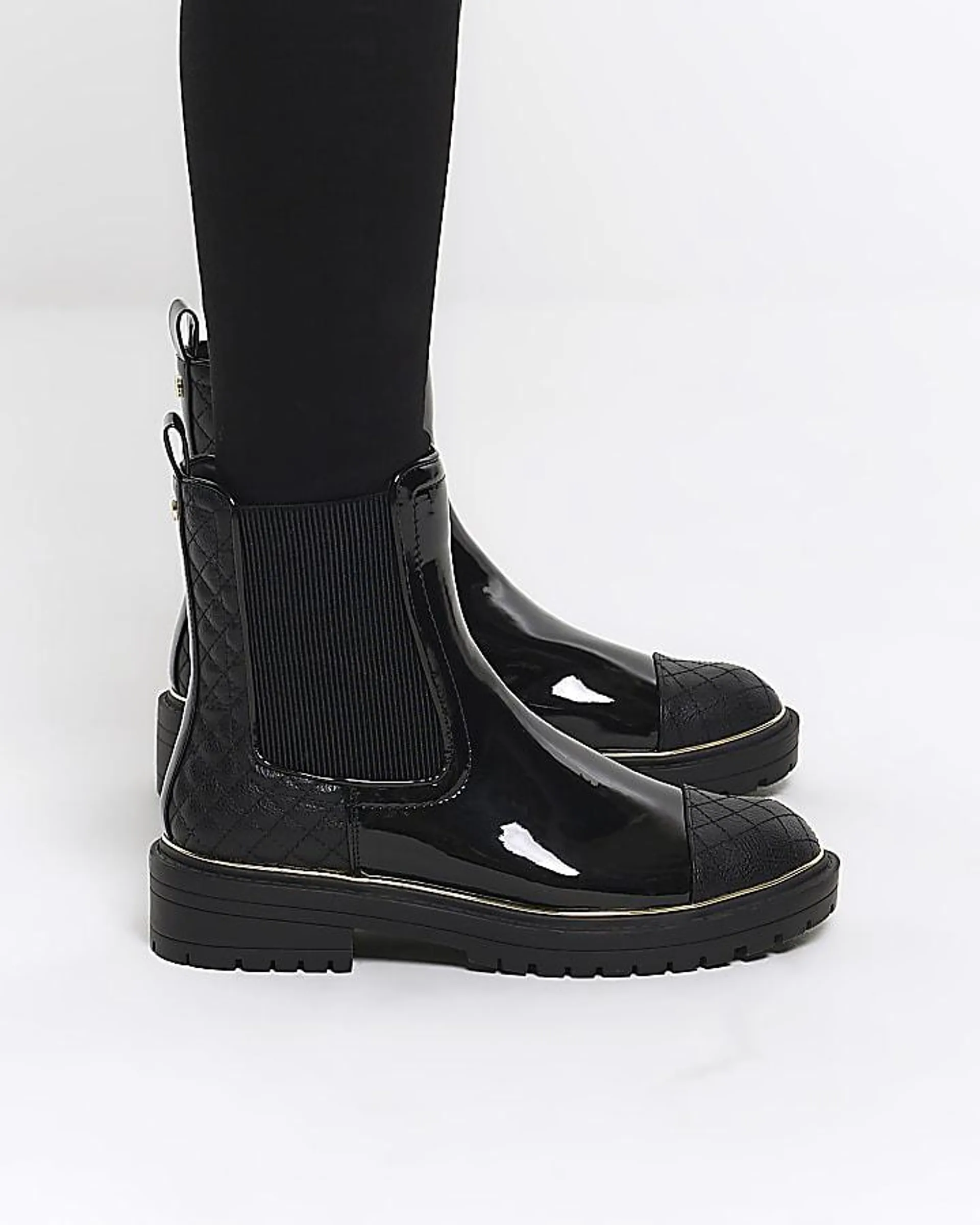 Black quilted chelsea boots
