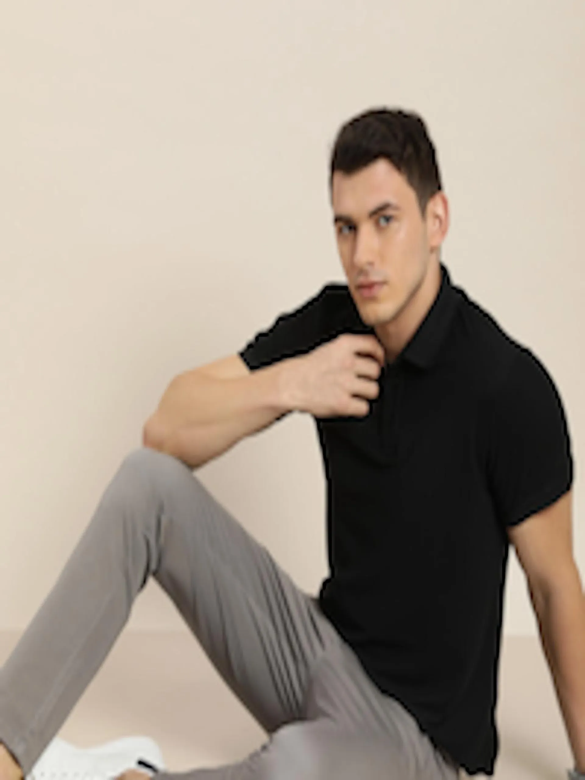 Men Black Solid Moisture-Wicking Antimicrobial Polo