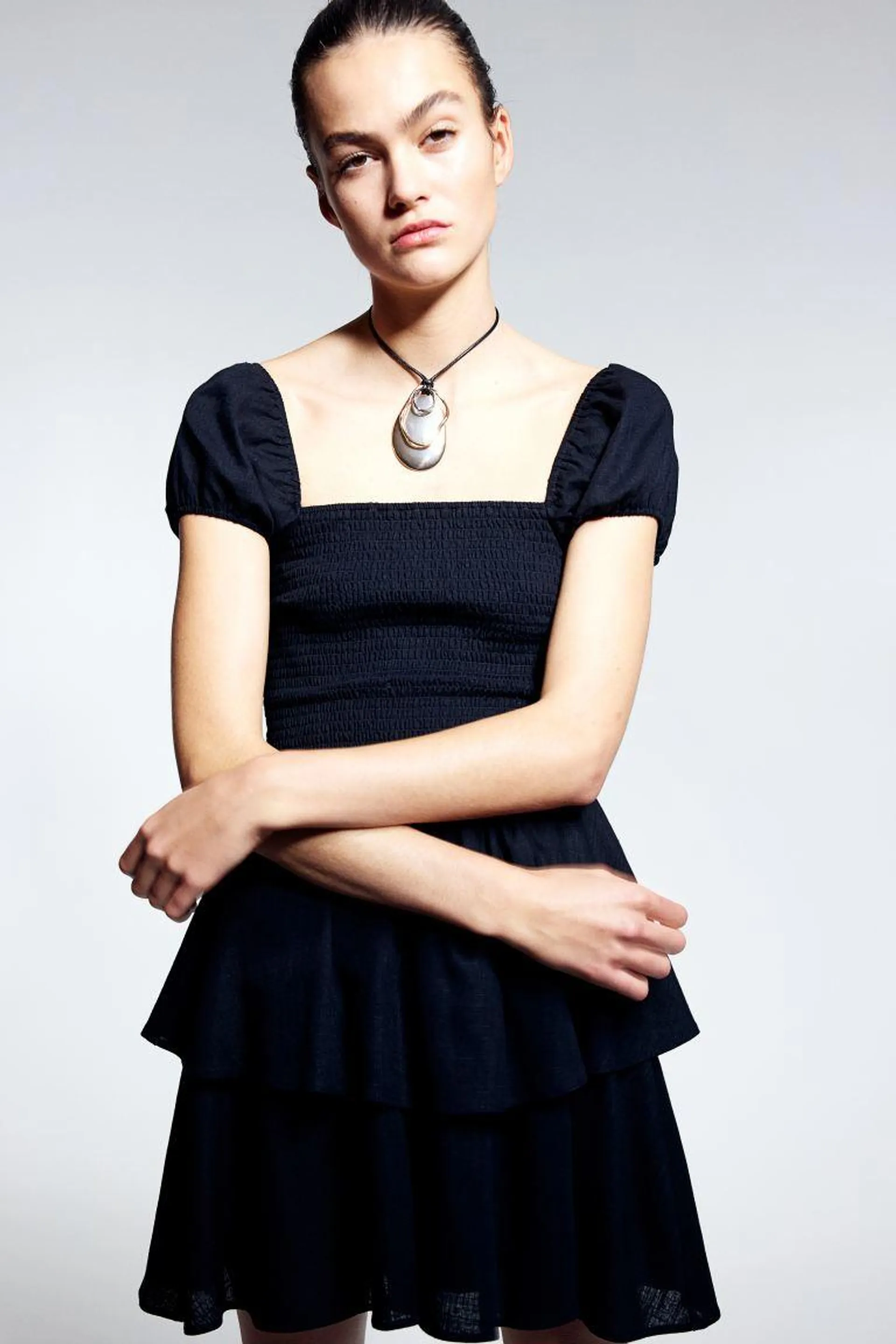 Tiered-skirt smocked dress