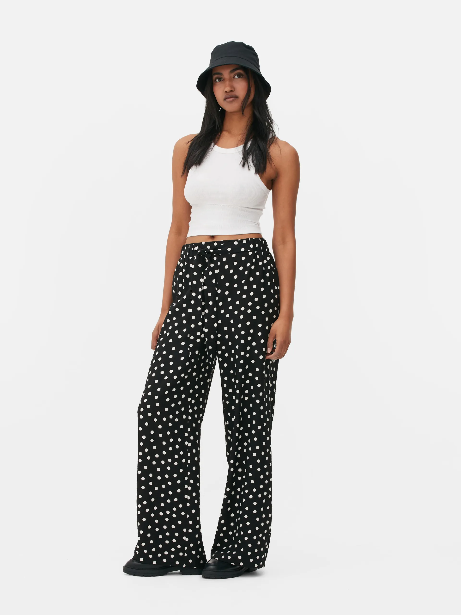 Pantalón palazzo estampado con lazada