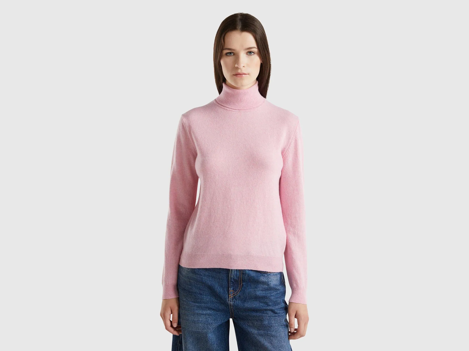 Maglione dolcevita rosa mélange in pura lana Merino