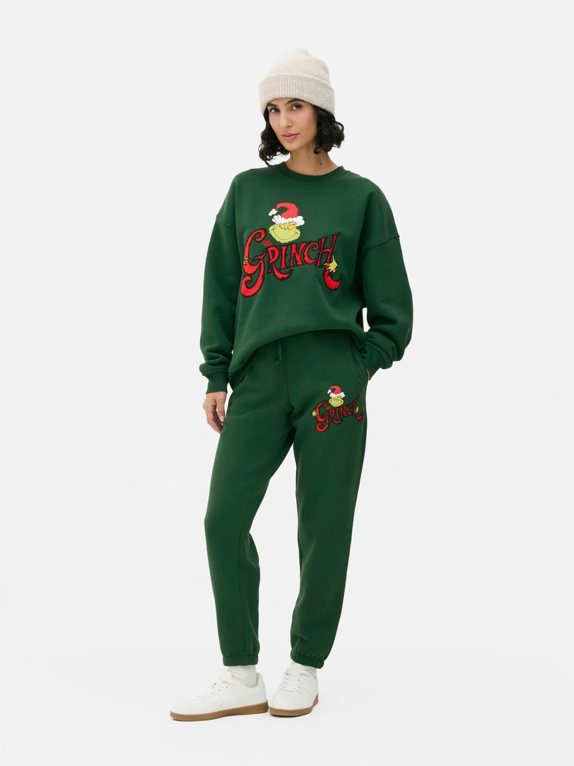 Joggers gráficos de El Grinch