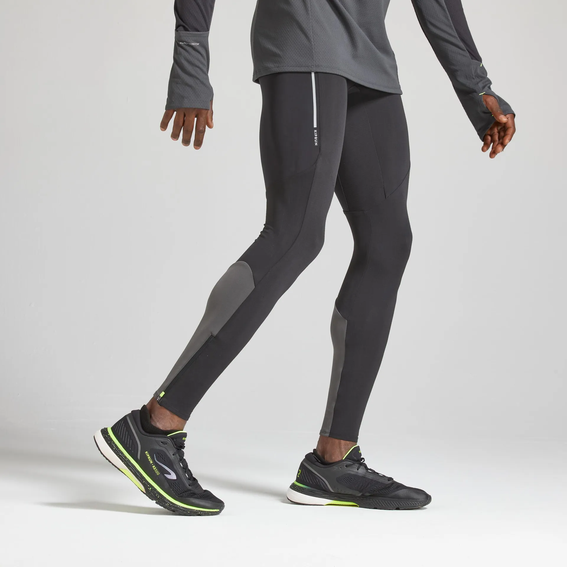 Leggings running uomo KIPRUN WARM nero-grigio