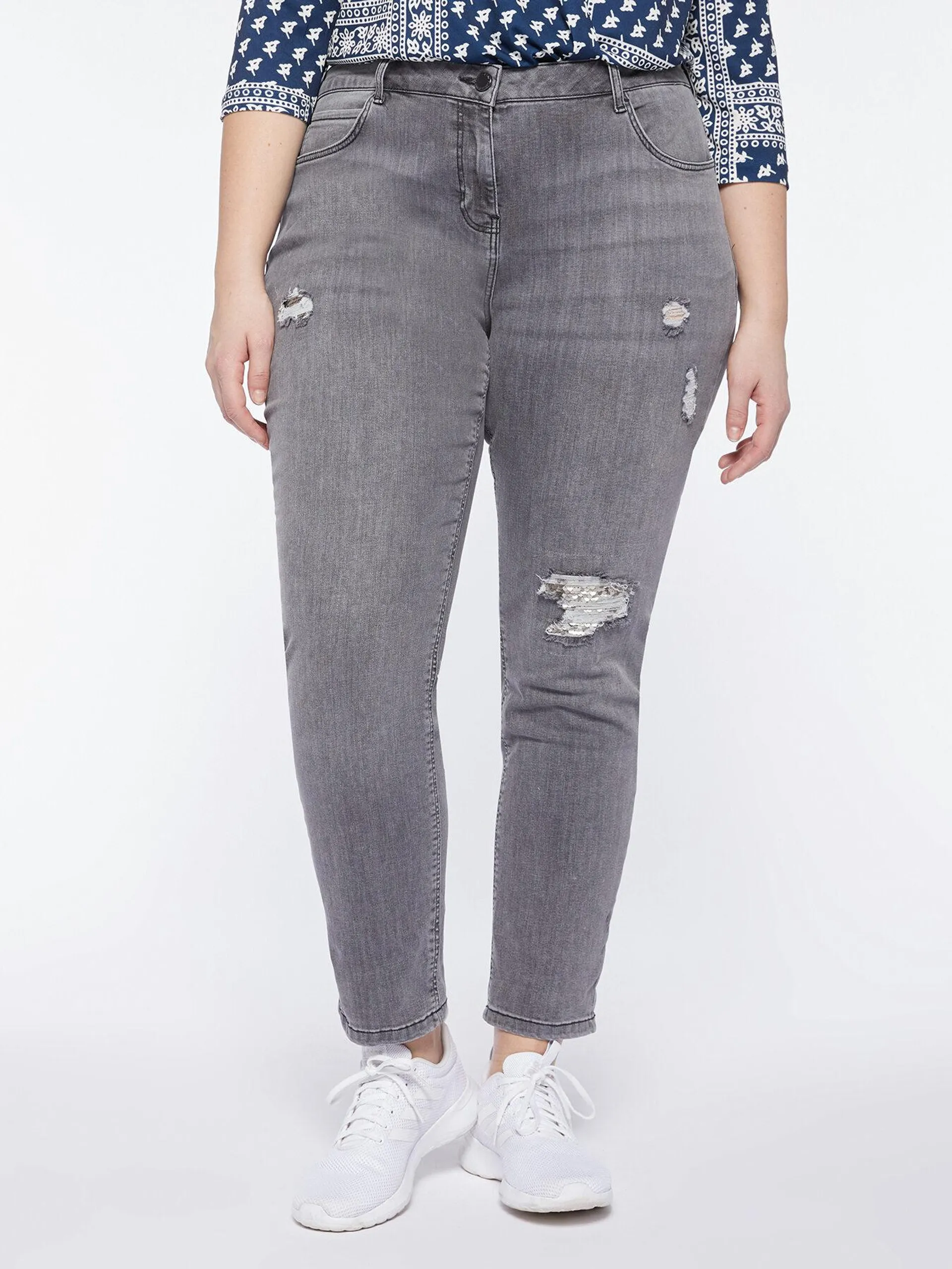 Jeans slim girlfit con strappi e paillettes