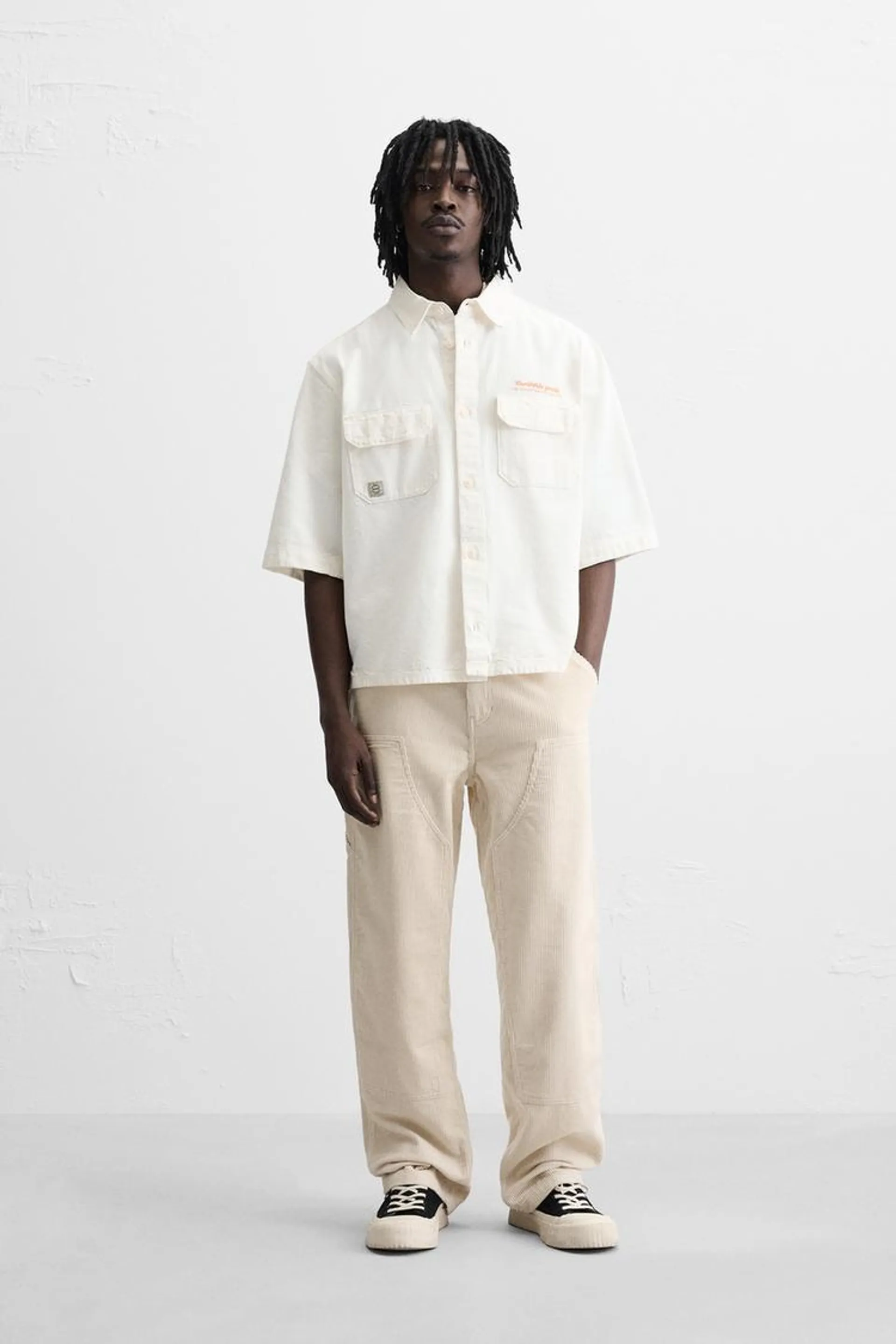 CAMISA TEXTO BORDADO