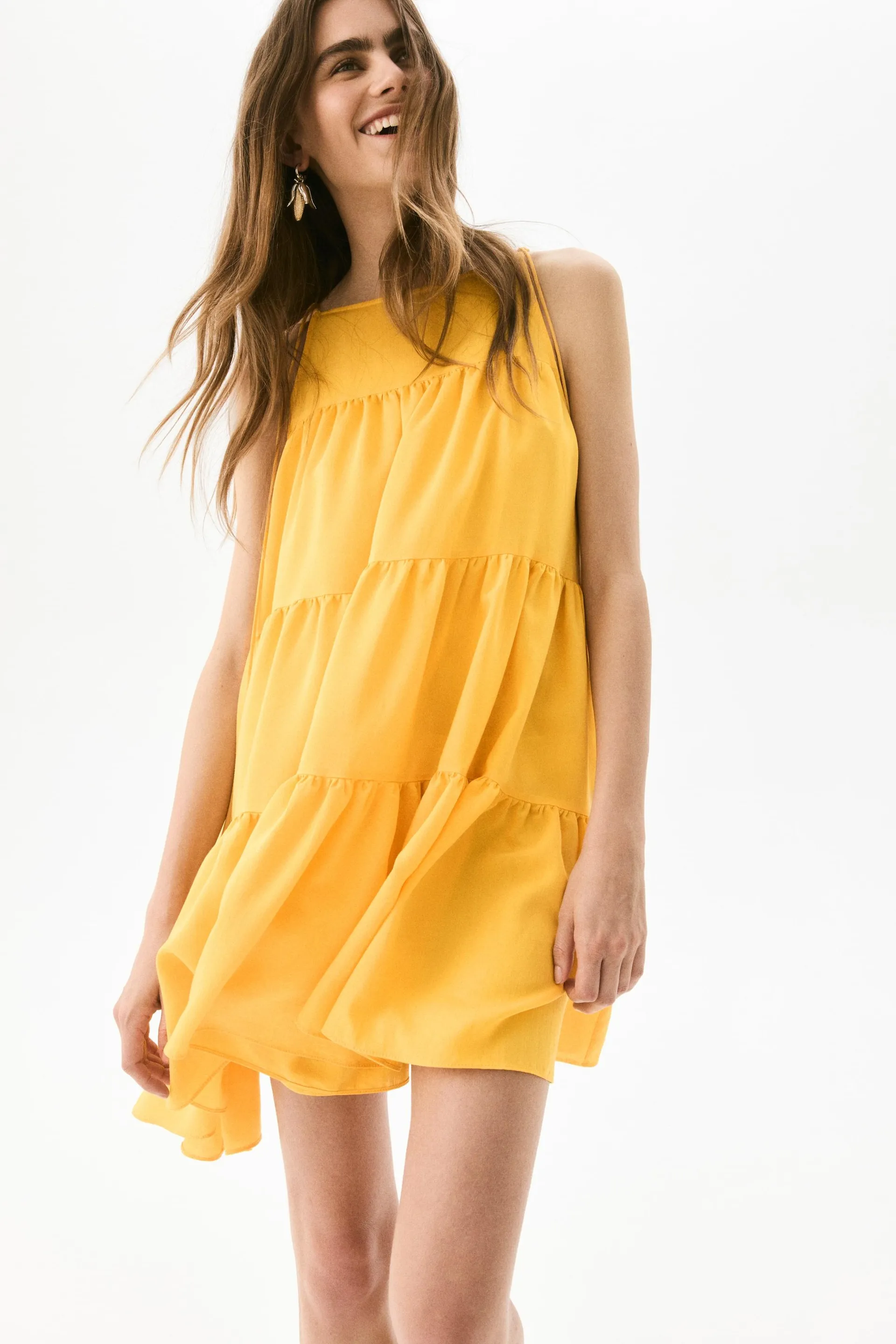Vestido línea A con capas