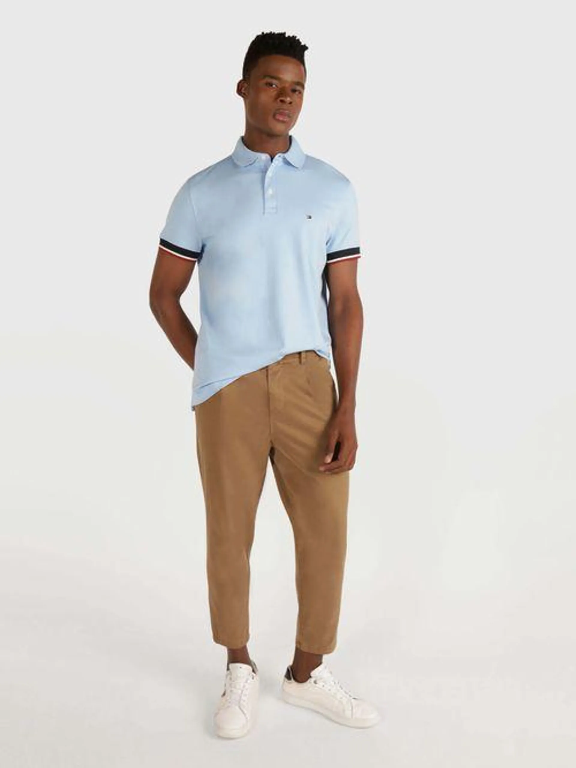 Polo con franja en mangas de hombre Tommy Hilfiger