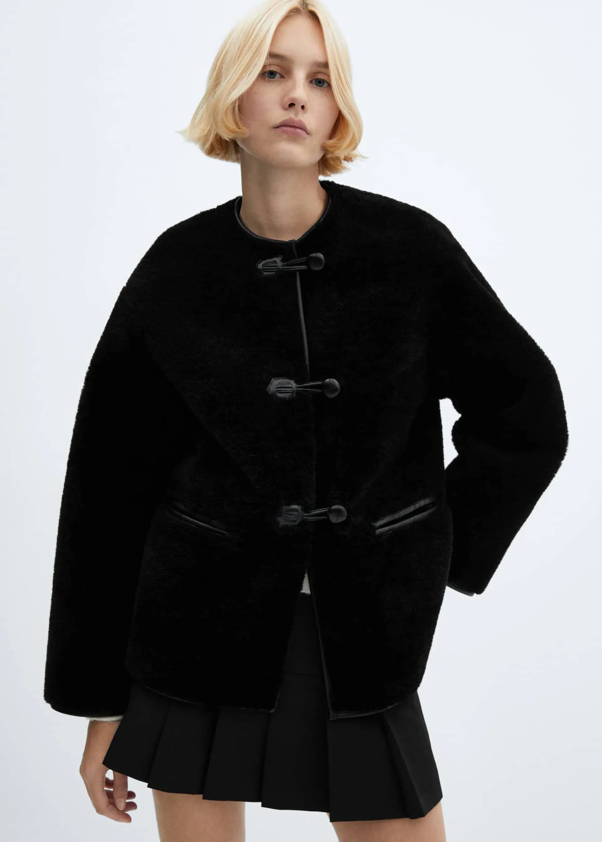 Fur-effect coat with appliqués