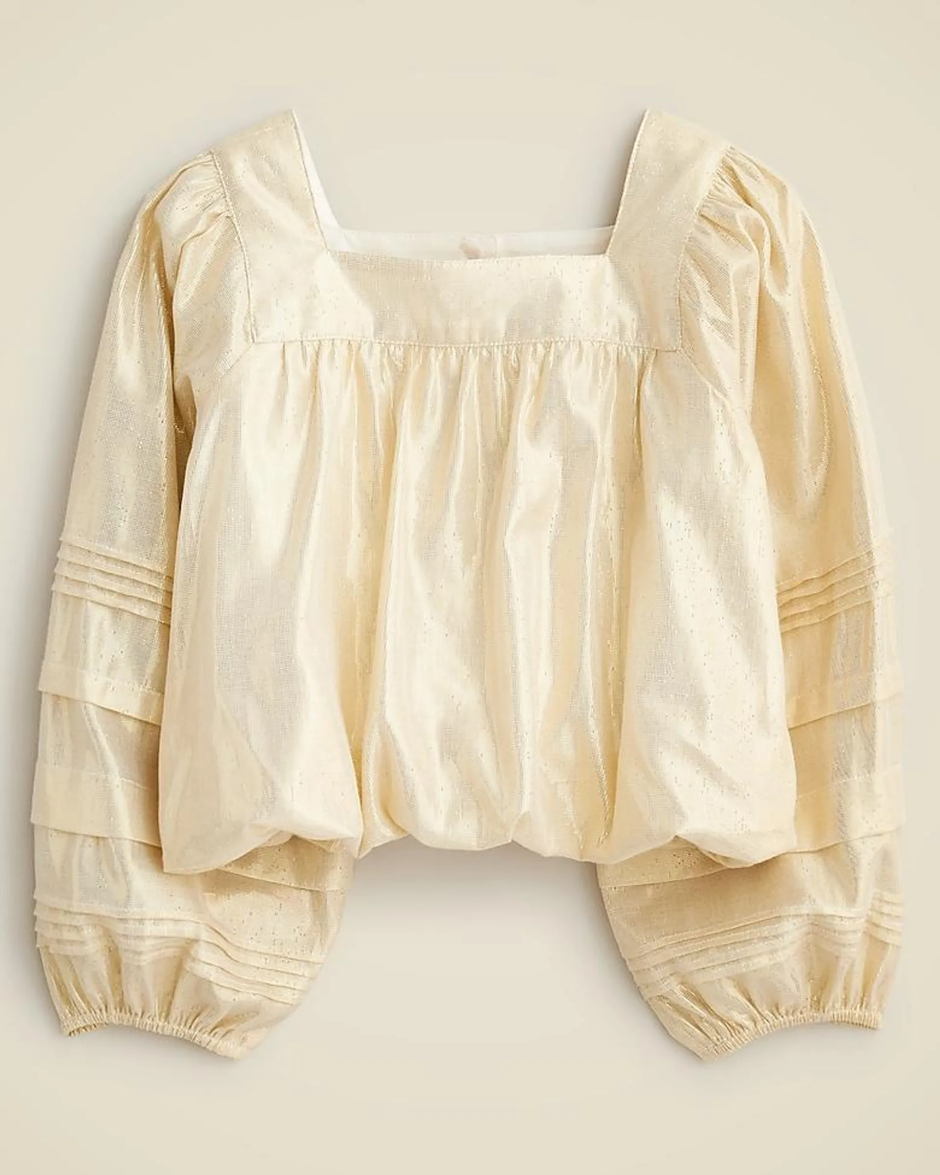 Girls' bubble-hem top in gold lamé