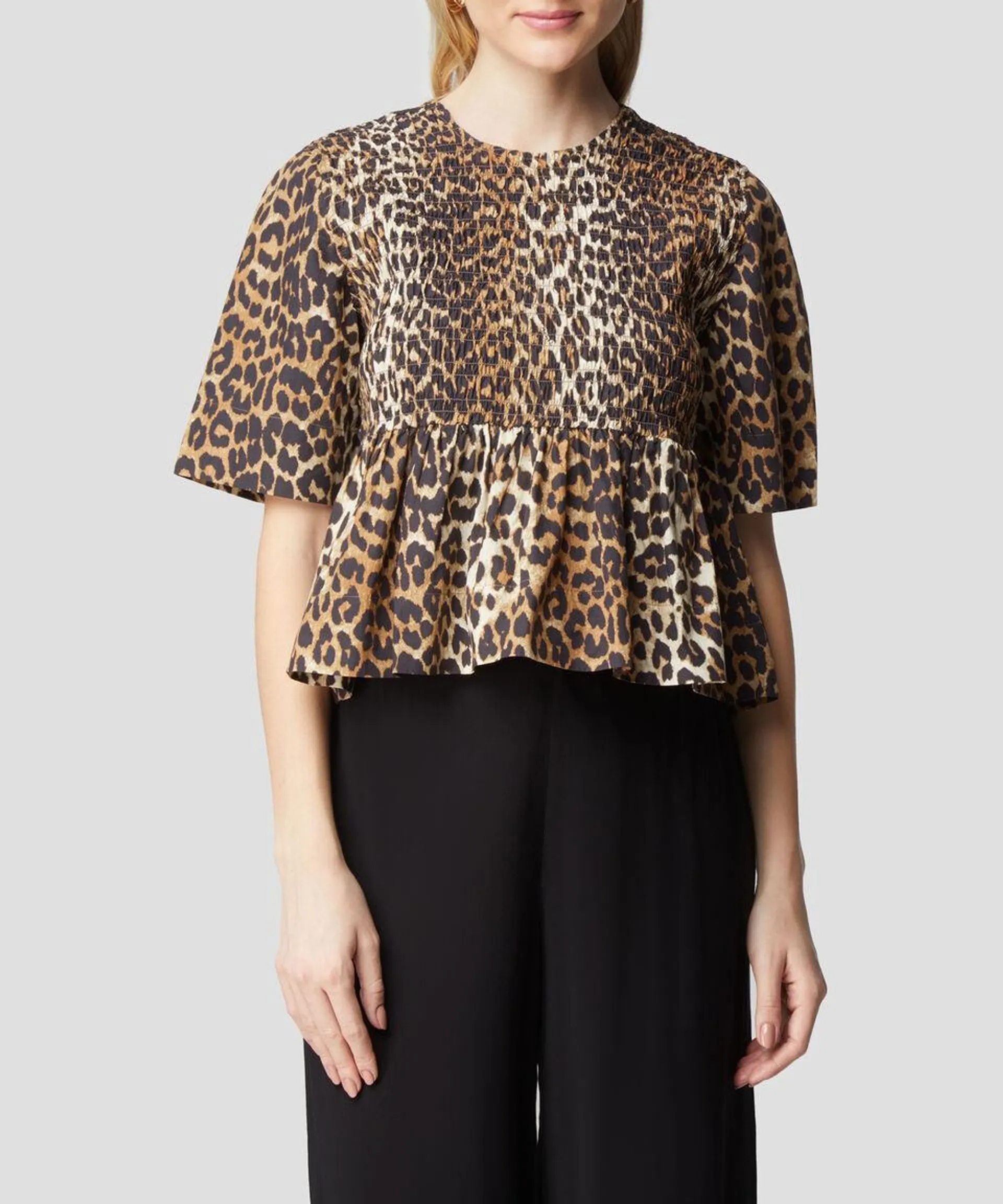 Blusa animalprint de manga corta Mujer