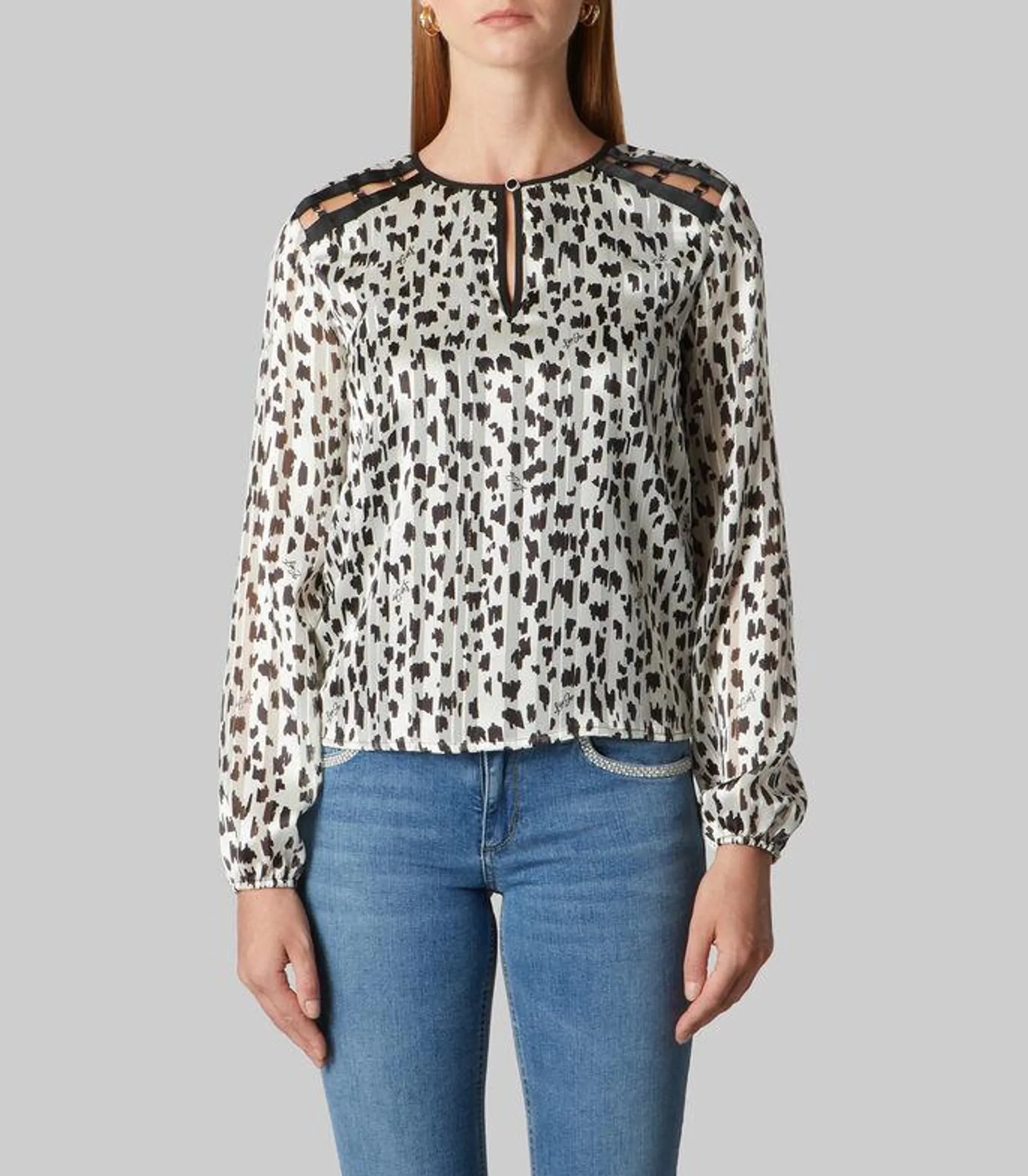 Blusa animalprint con manga larga Mujer