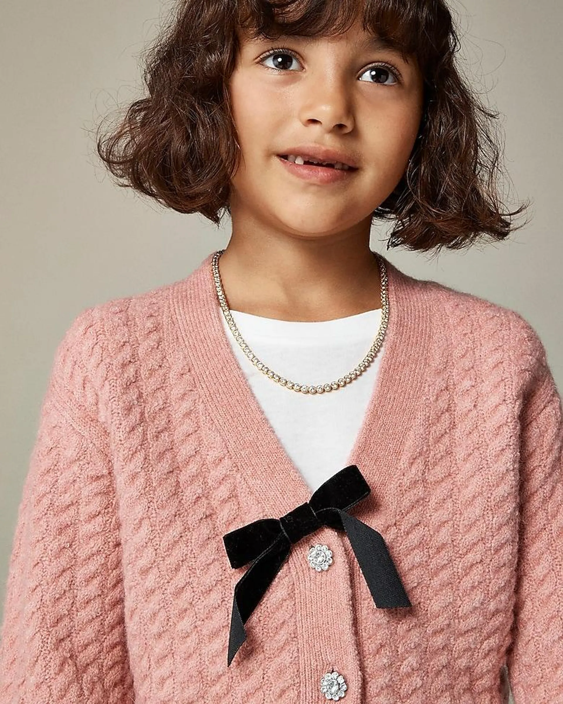 Girls' cable-knit cardigan sweater in Supersoft yarn