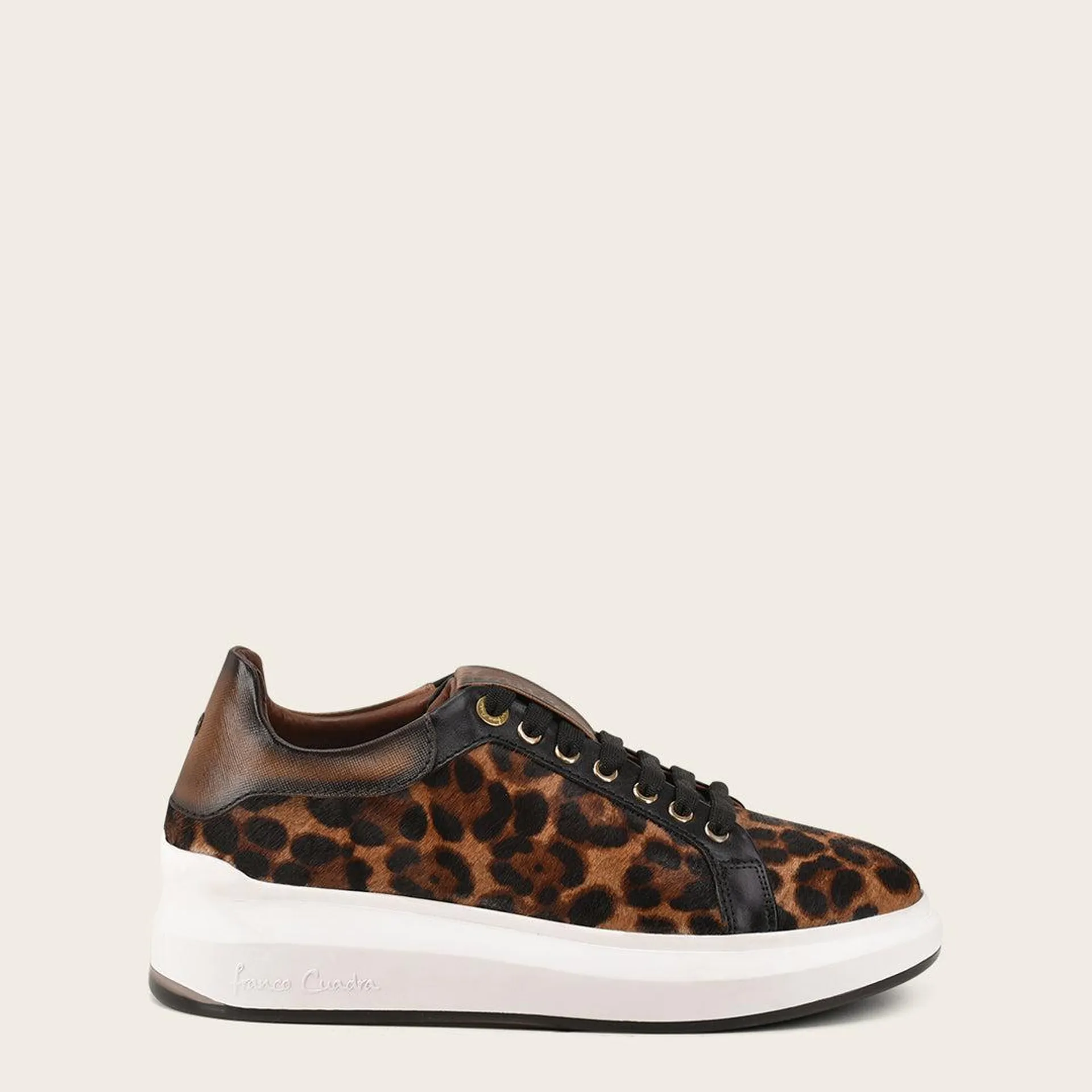 Sneakers animal print en pelo genuino